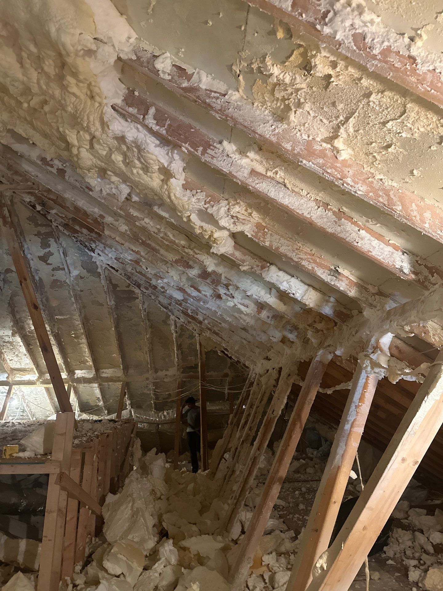 Spray foam insulation removal & re spray by Apex Insulation Solutions