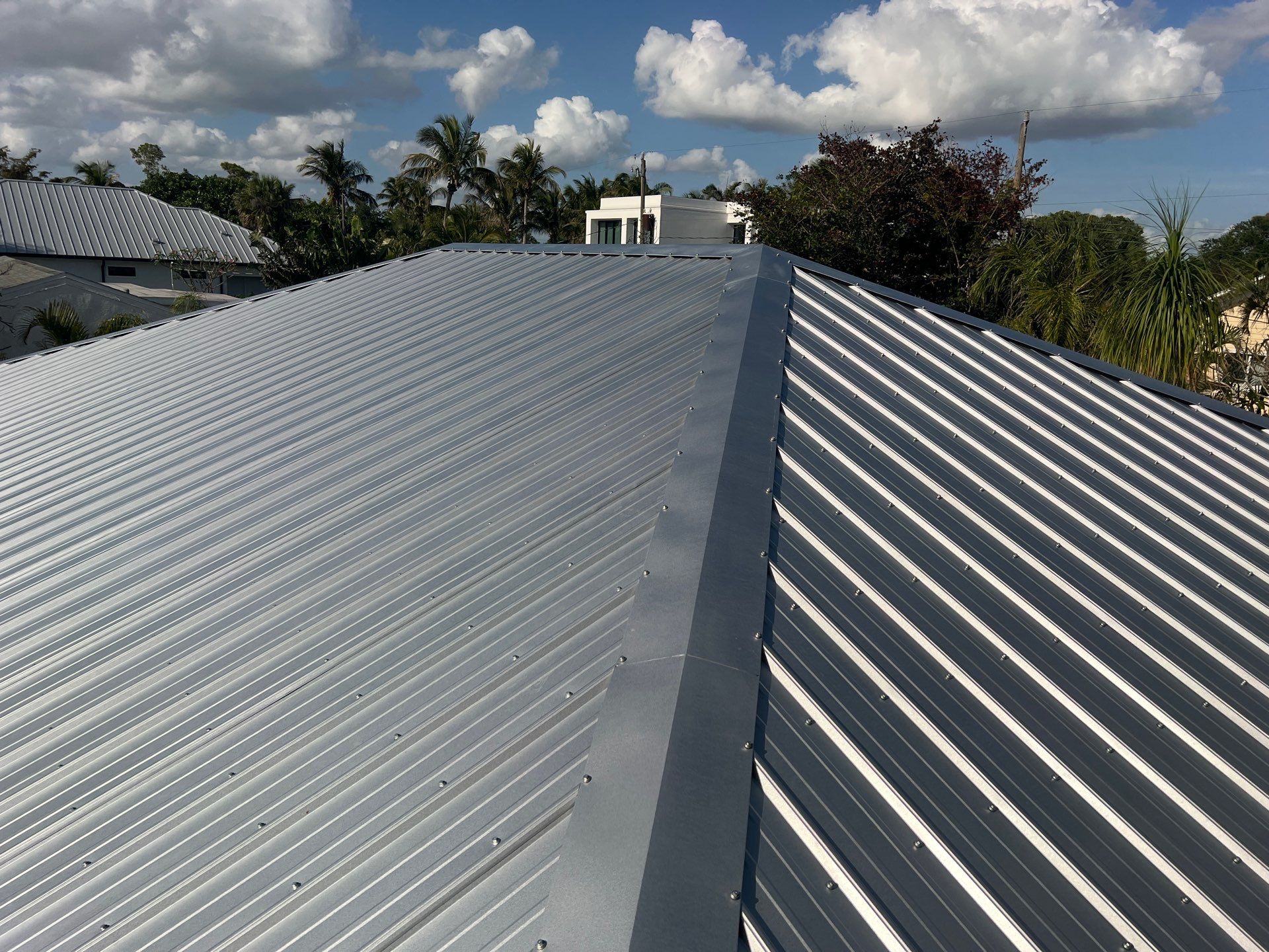 Residential Roofing Installation using Durabull Classic Rib Panel by Durabilis Roofing INC