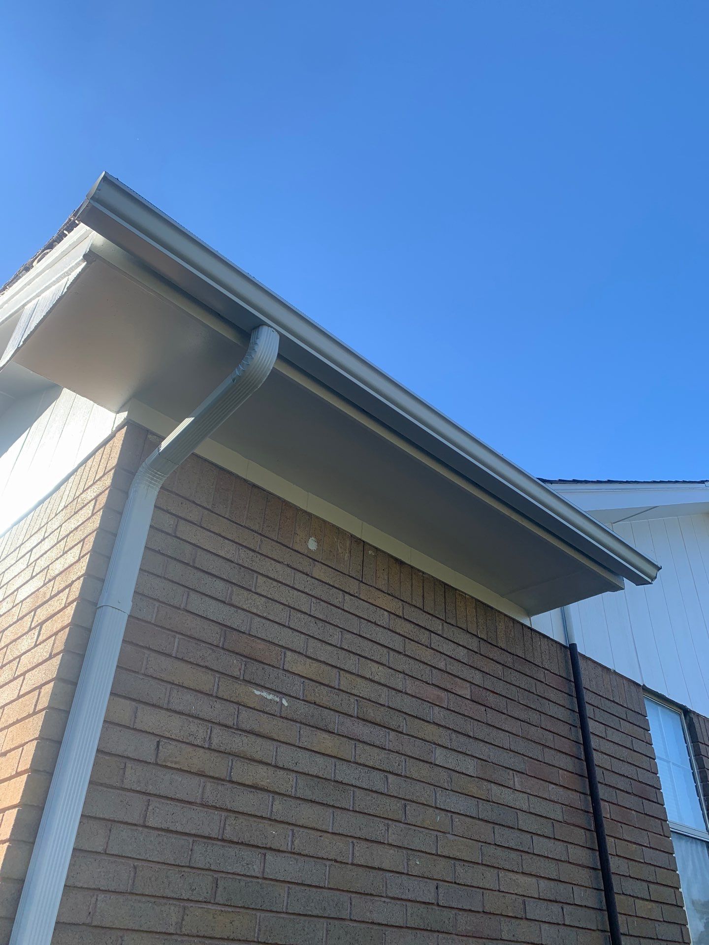 gutter install & soffit repair & exterior paiting in Oklahoma City by McCann's Roofing and Construction