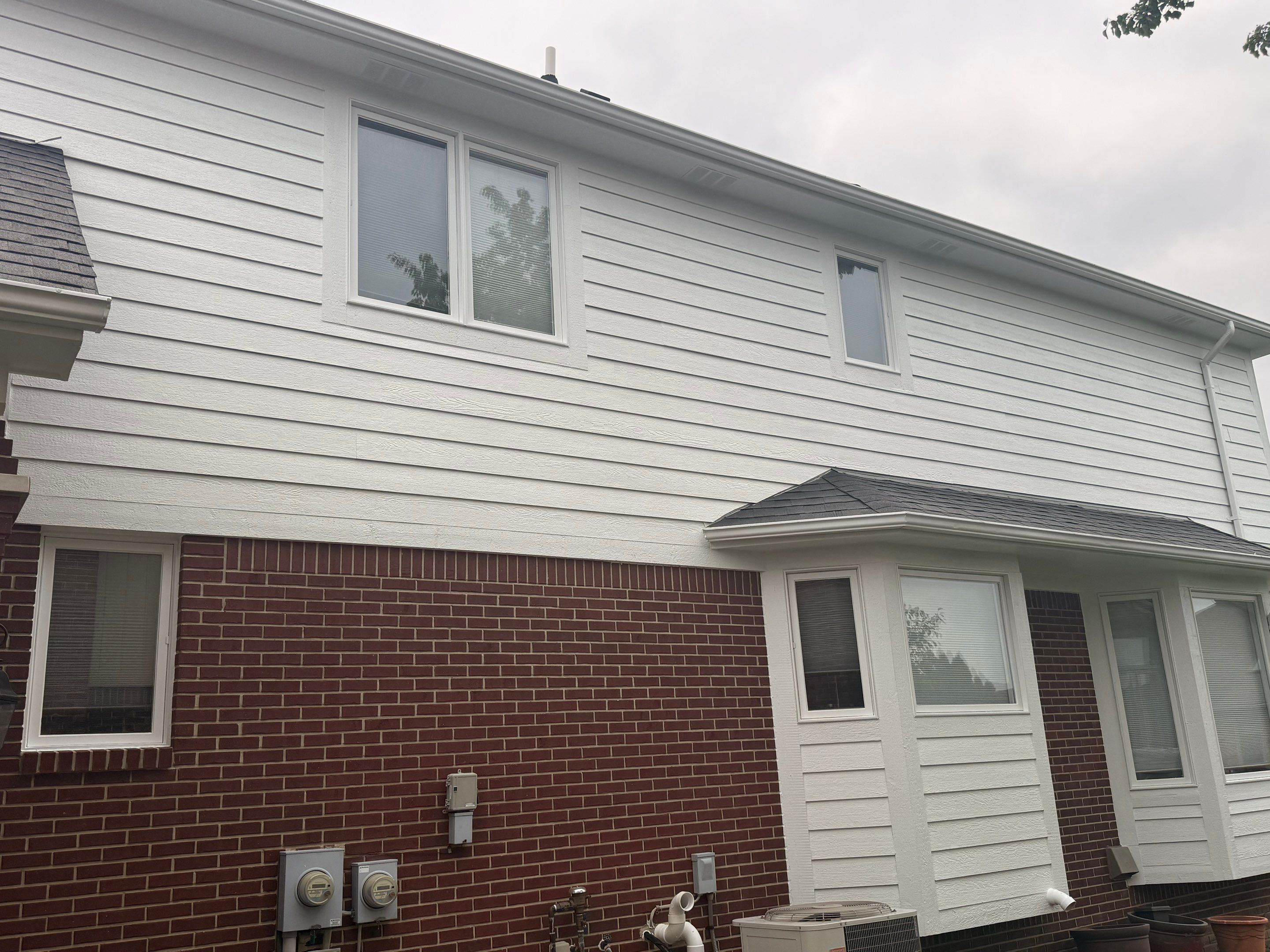 Exterior Wood Rot Repair and Trim Restoration in White Lake by Top Shelf Painter