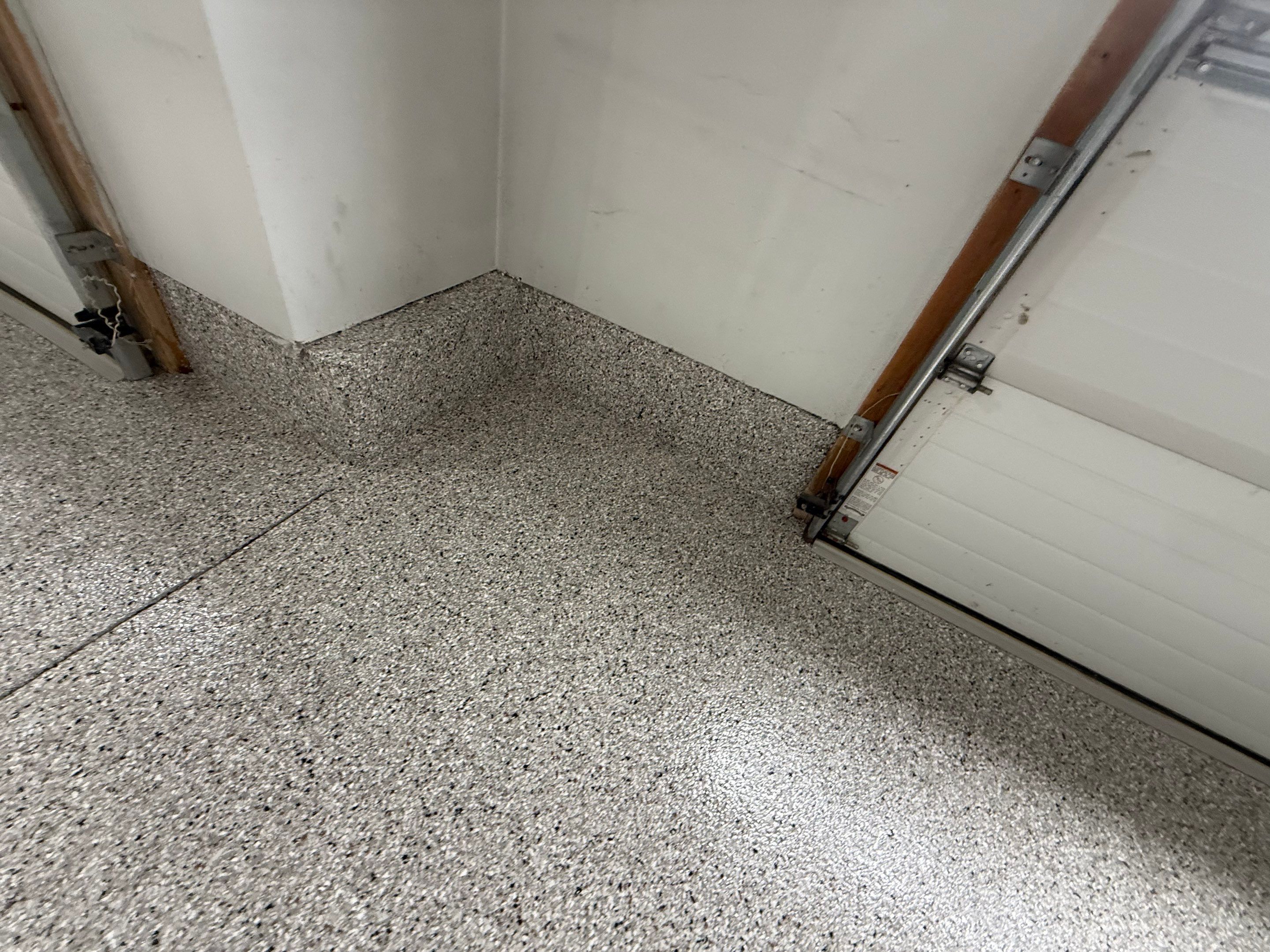 High-Gloss Epoxy Garage Floor Coating in Sioux Falls by Select Painting, Coatings & Garage Cabinets