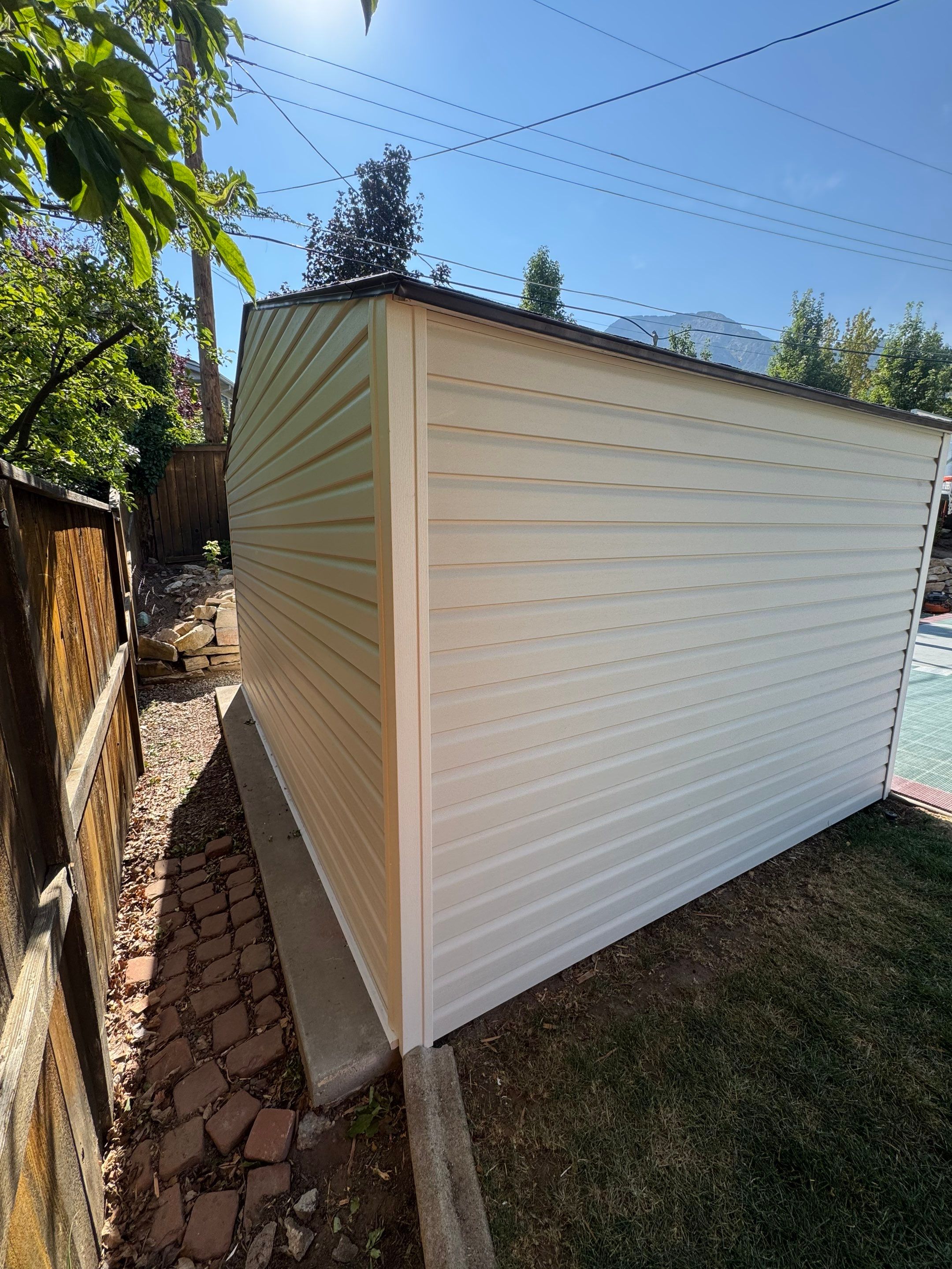 Salt Lake City | Targeted Vinyl Upgrade & Detached Shed | Arctic White Accents by Ideal Siding Utah