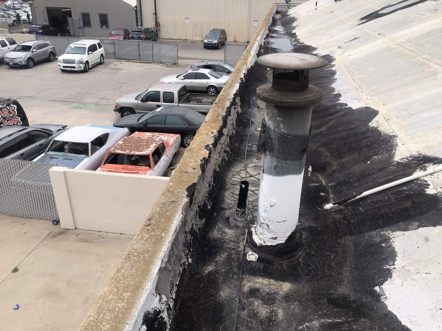 Spray foam and coatings using Conklin Benchmark/PUMA XL coatings and spray foam by Straight Edge Roofing Inc