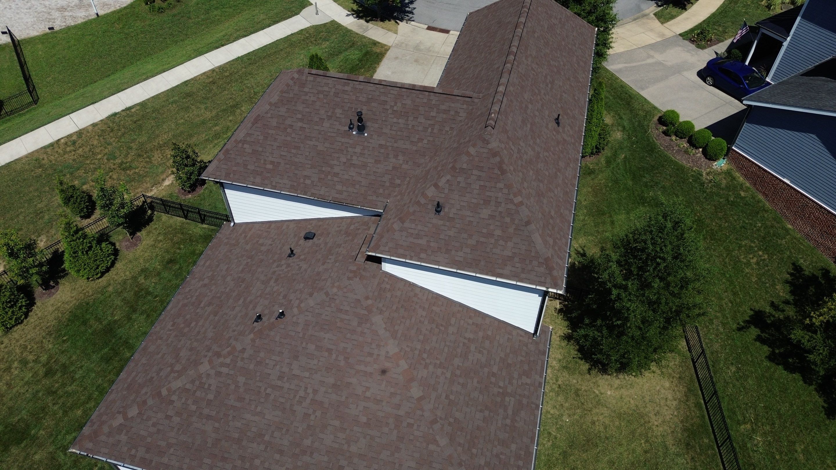 Architectural Asphalt Shingle Roof Replacement and Downspout Installation in Franklin by Shinglesmiths Roofing