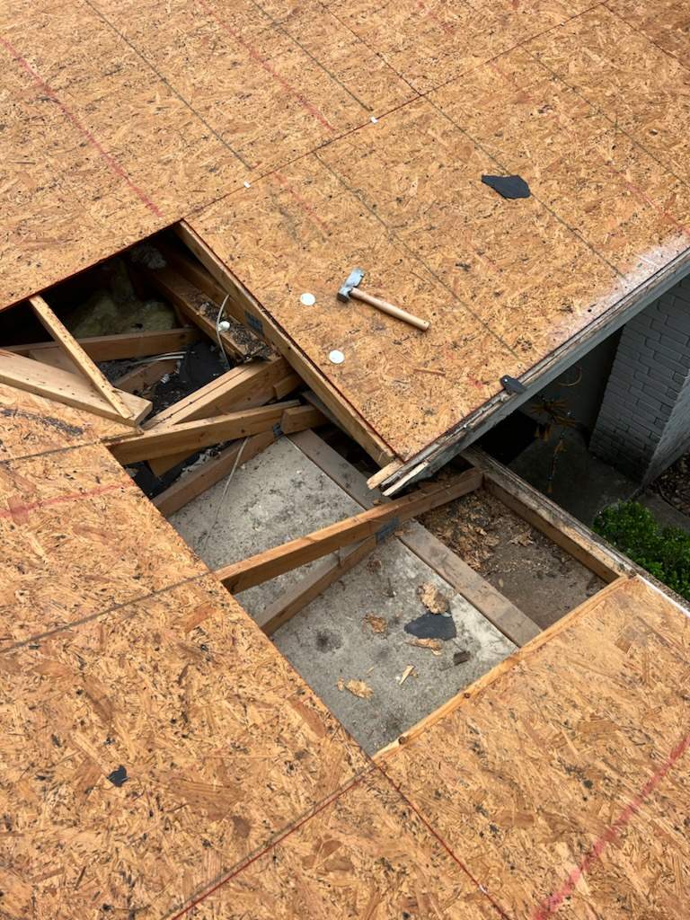 Rental property upgrade using CertainTeed Landmark shingles. by Oakwood Roofing and Construction, LLC