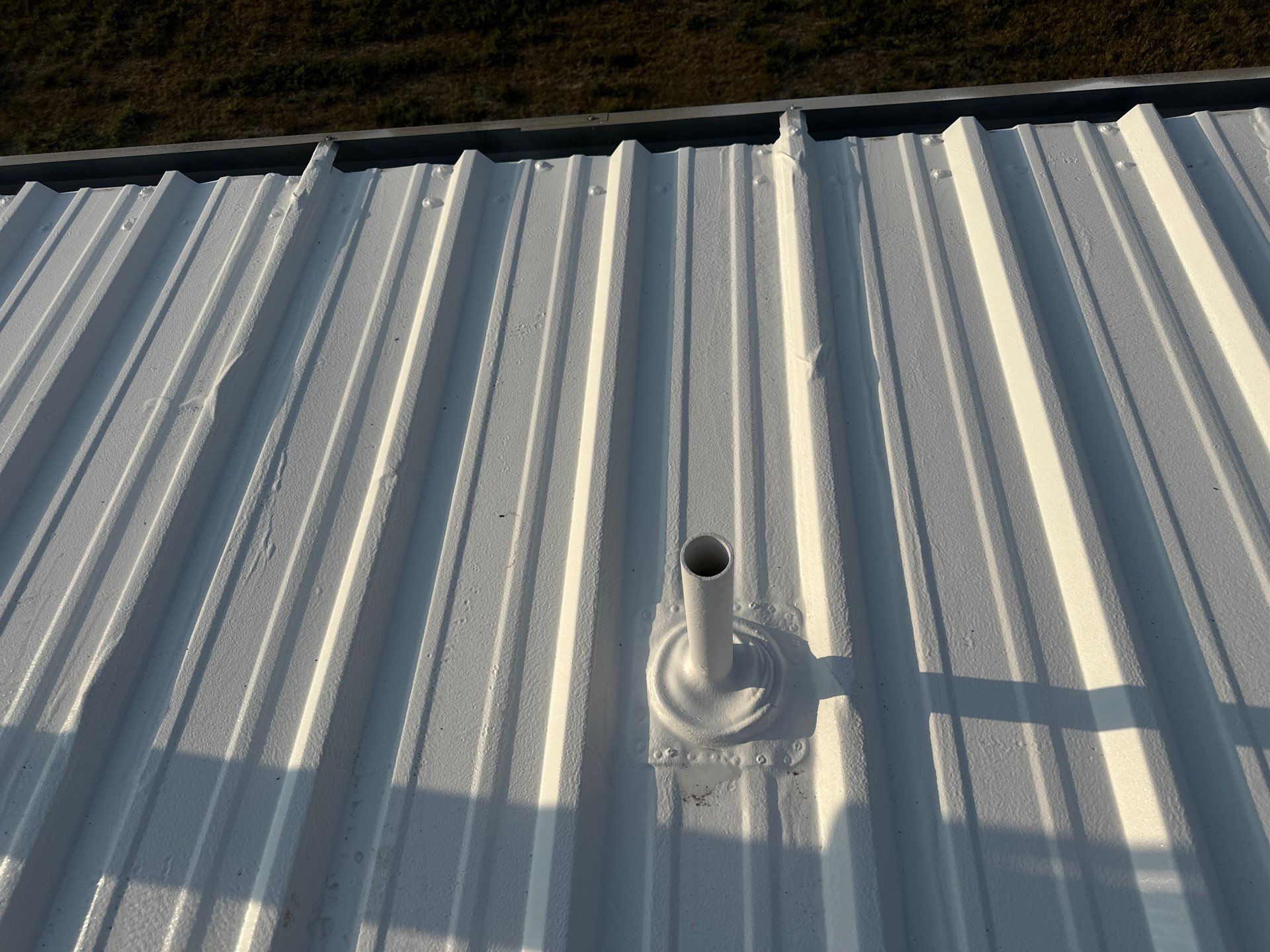 Commercial Roofing Install - Metal Coatings Restoration System  - Color White  by Titan Commercial & Residential Roofing 