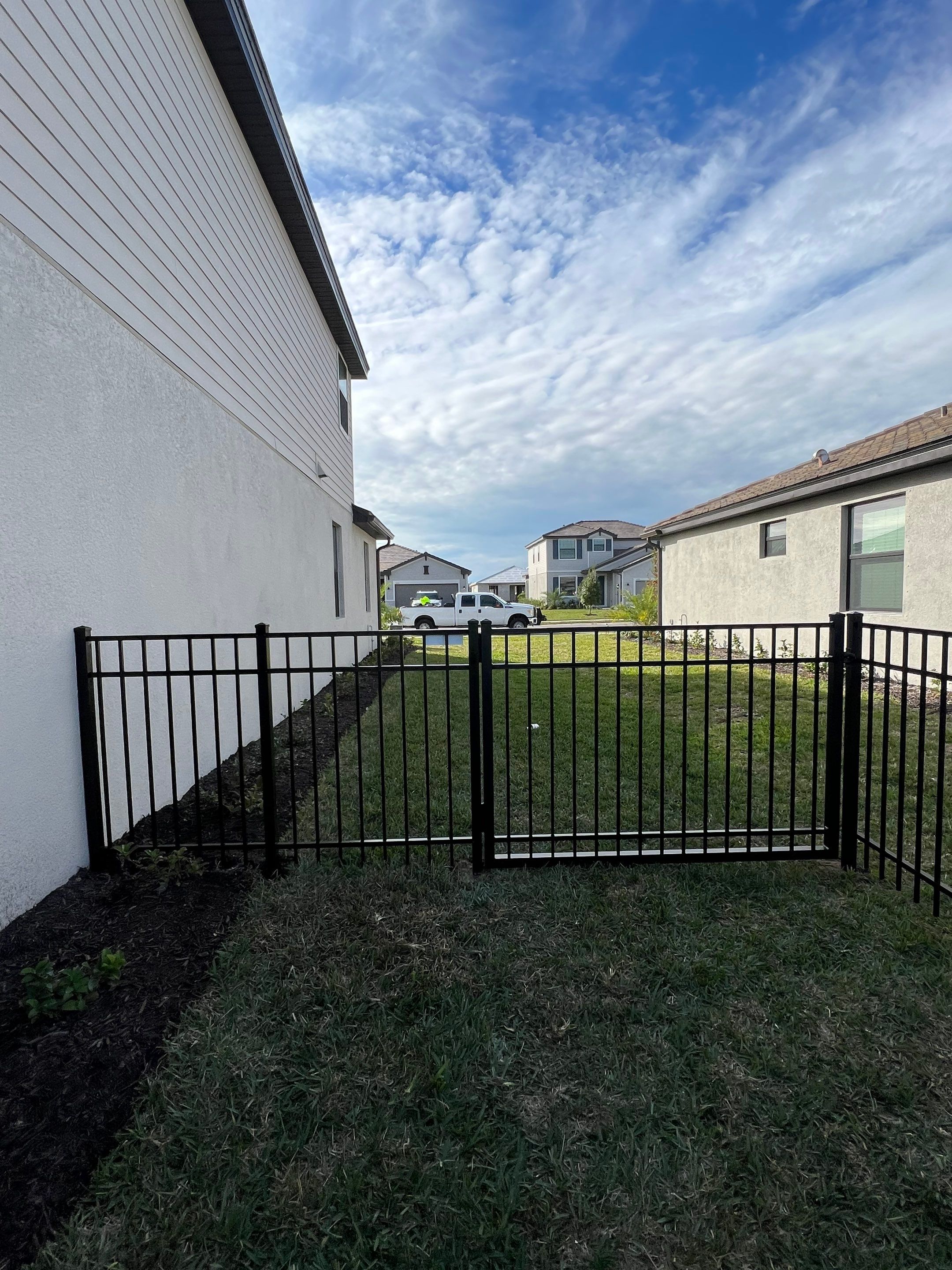 Aluminum Fence Installation using Black 3 Rail Aluminum Fence by Asap fence and gates, LLC