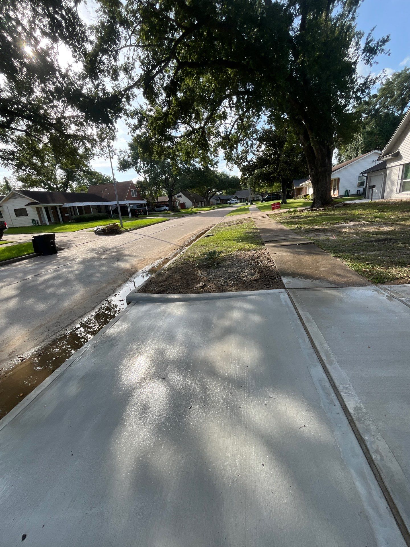Houston Residential Concrete Driveway Installation and Bathroom Remodel by Rolling Nations