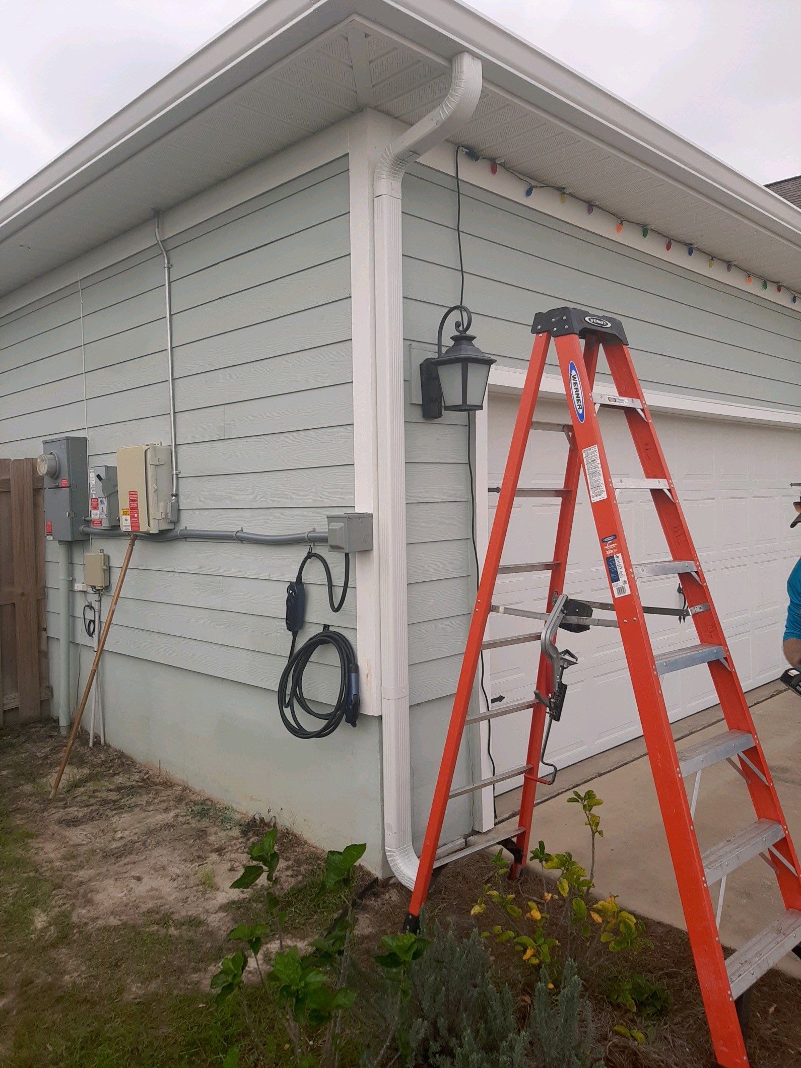Gutter Installation Using White K-Style Seamless Gutters by Gutter Professors