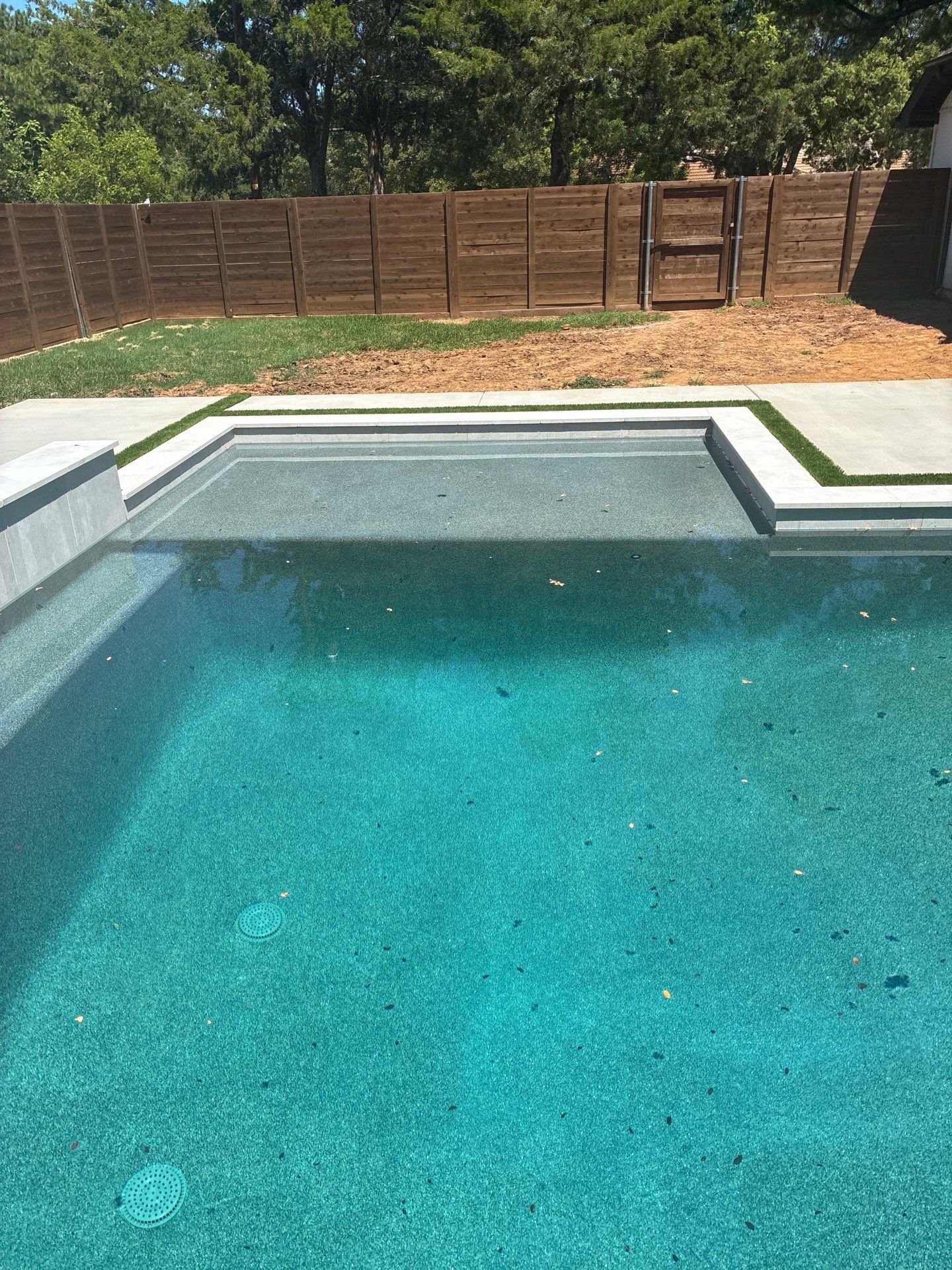 Modern Geometric Pool with Integrated Spa and Turf-Inlaid Decking by Pinnacle Pools and Spas - DFW
