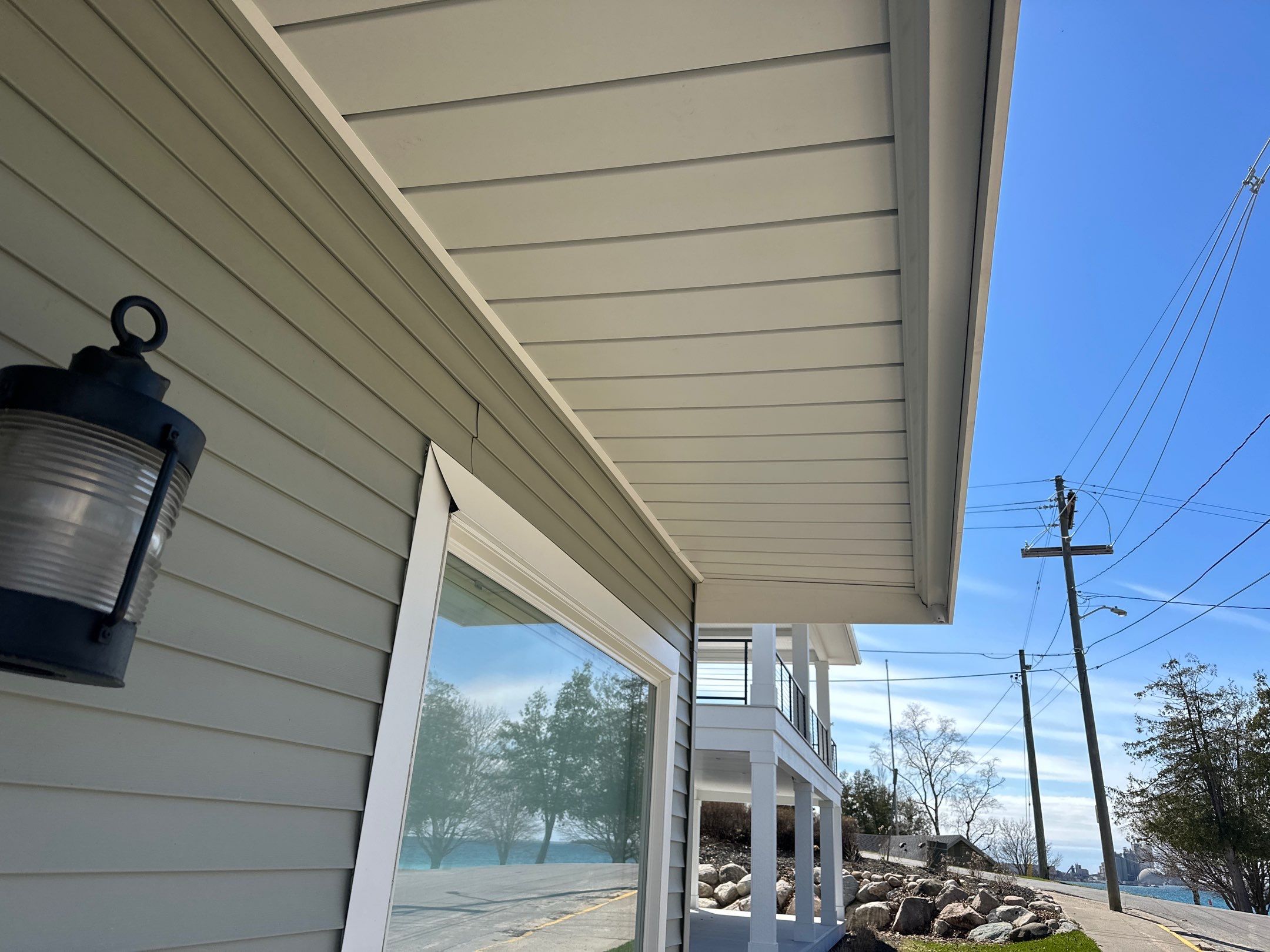 Custom Underdecking System and Soffit Installation in Charlevoix, Michigan by Rainbow Seamless Systems