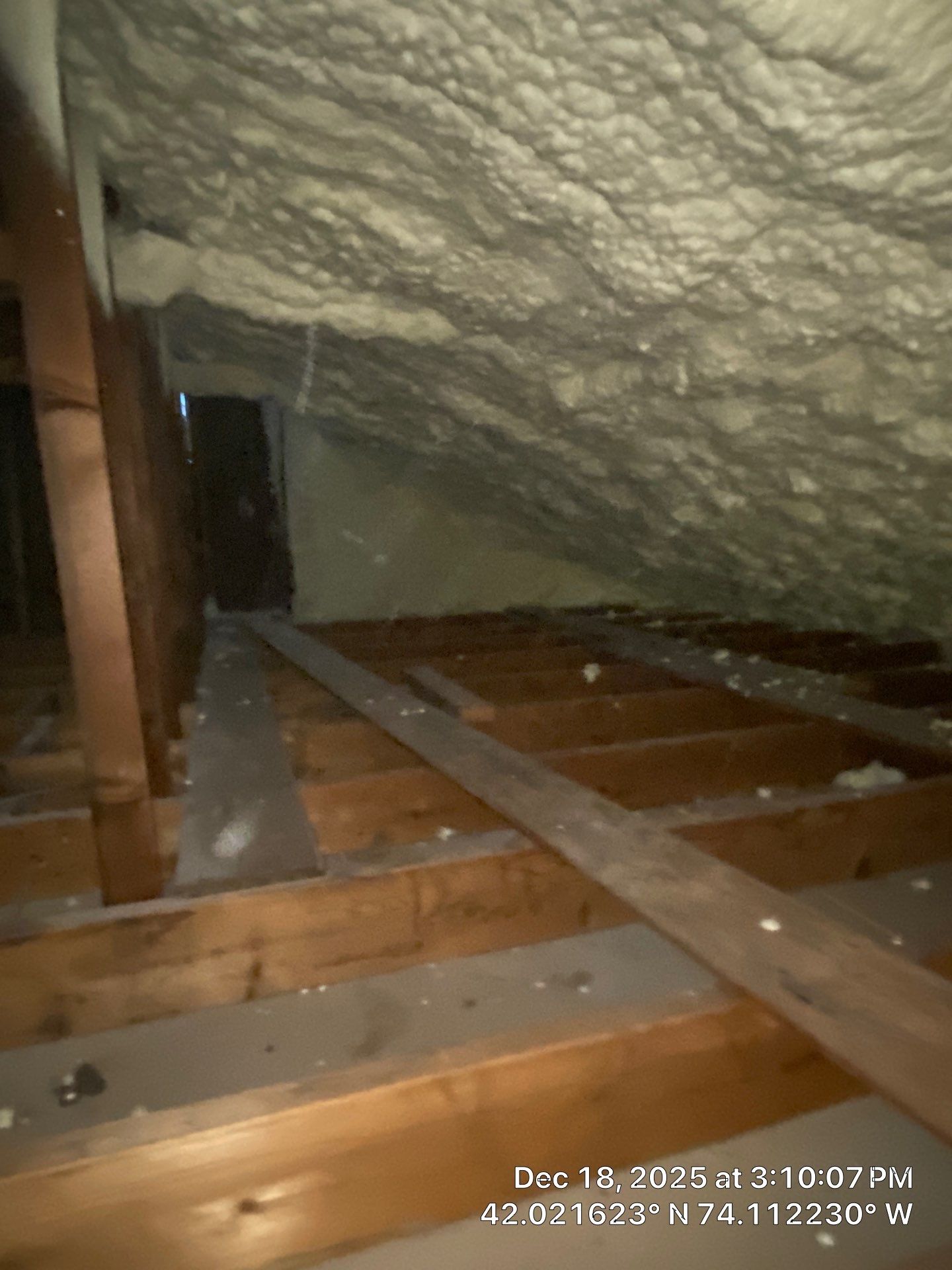 Attic Insulation using open cell spray foam by NYS Foam & Energy