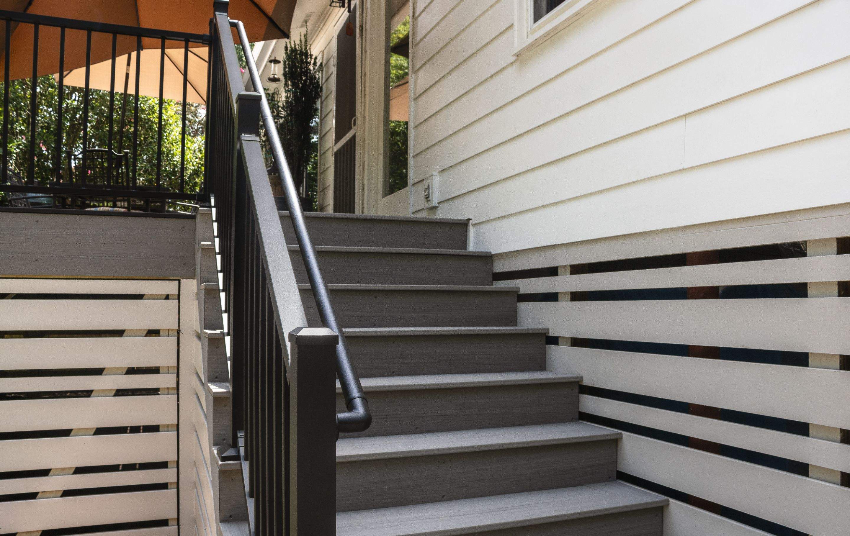 Atlanta, GA Deck Replacement and Hog Board Underpinning Install with Deckorators Summit Series Decking and Hardie Trim by Nelson Exteriors 