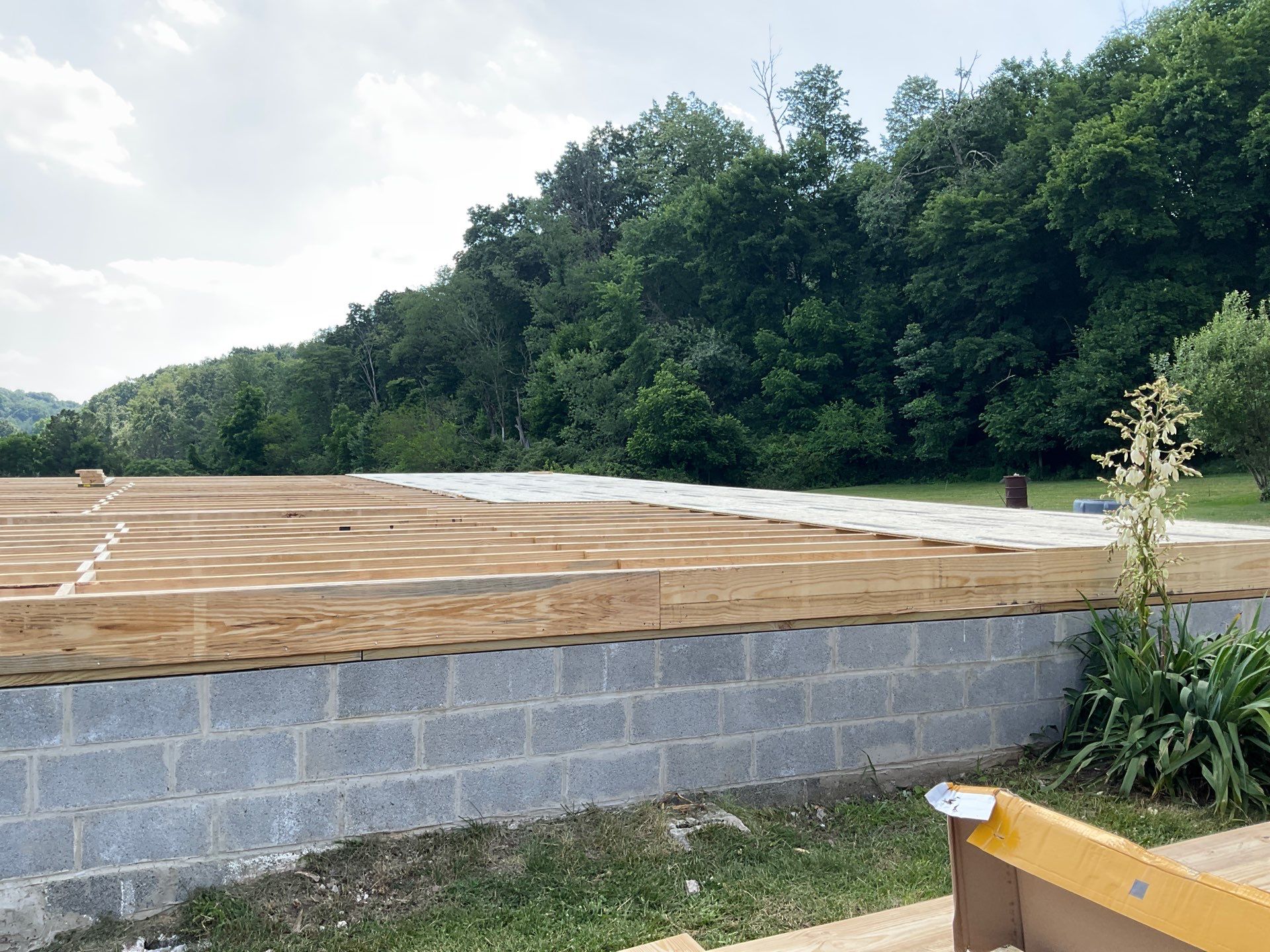 New Residential Addition with Blue Siding and Metal Roofing in Ashland by Esh Builders