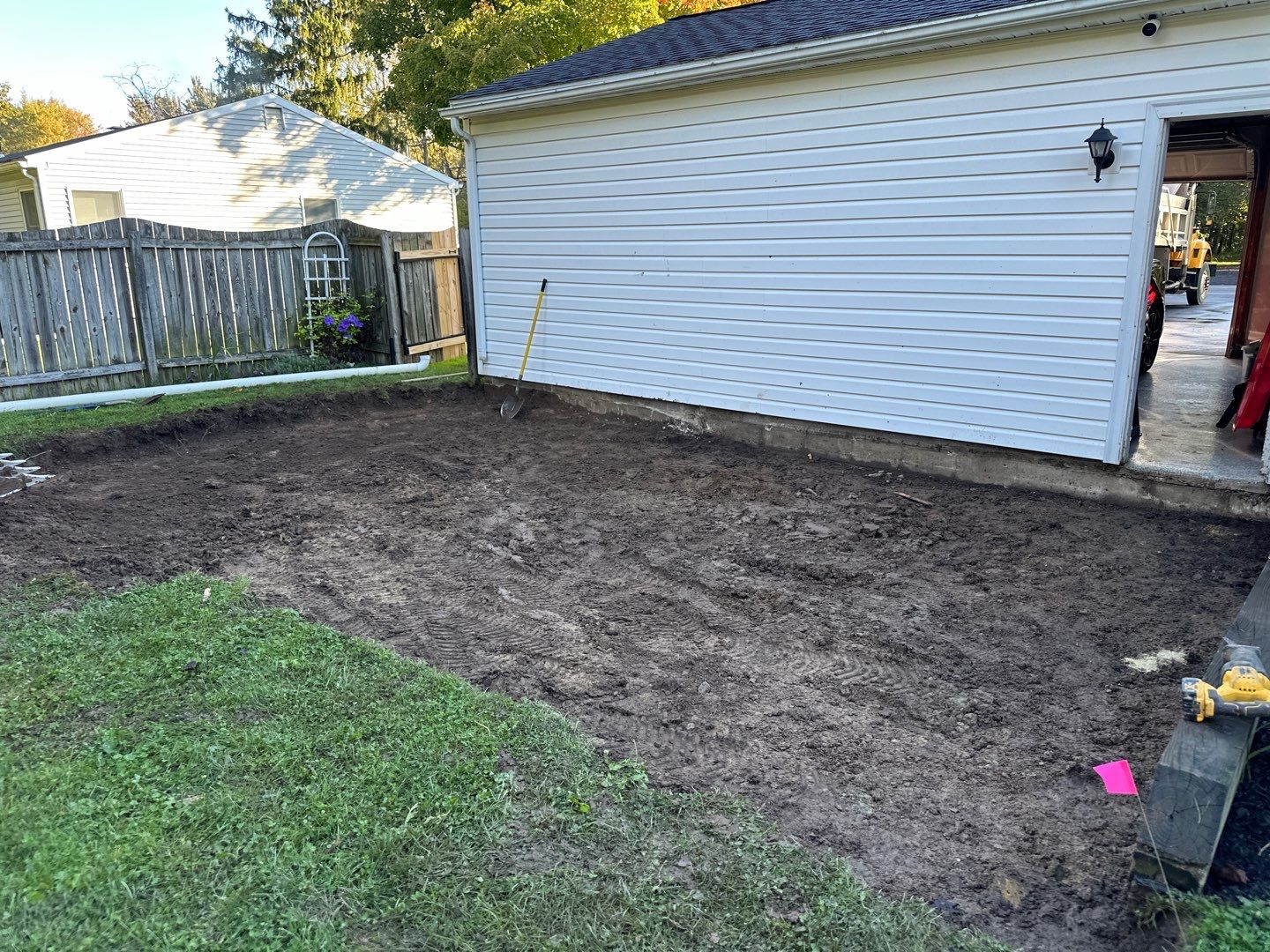Majestic Ashlar stamped concrete patio with a border  by NG Masonry & Construction LLC