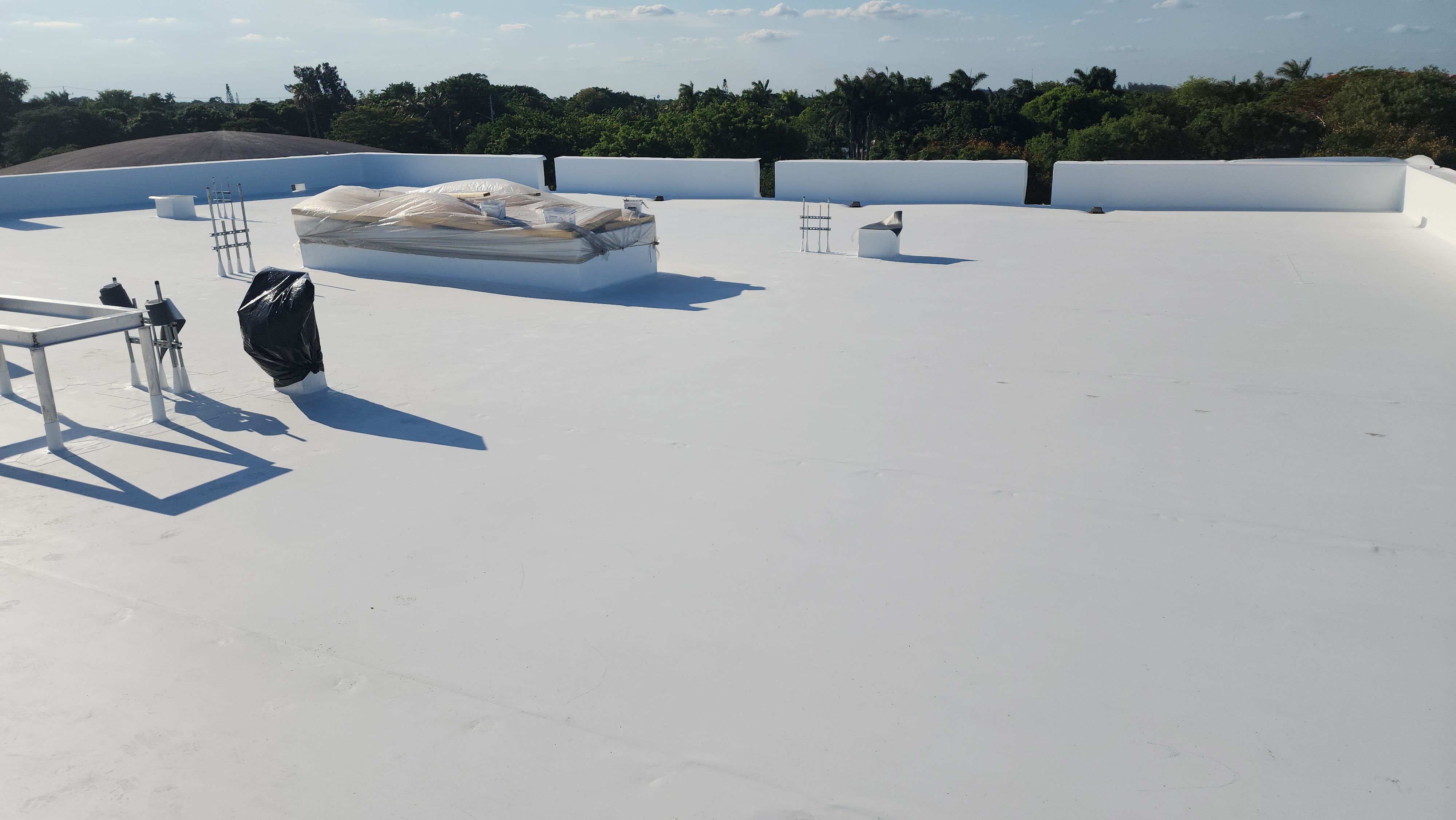 TPO Flat Roof Installation at Dade Quail Roost in Miami by AJF ROOFING INC
