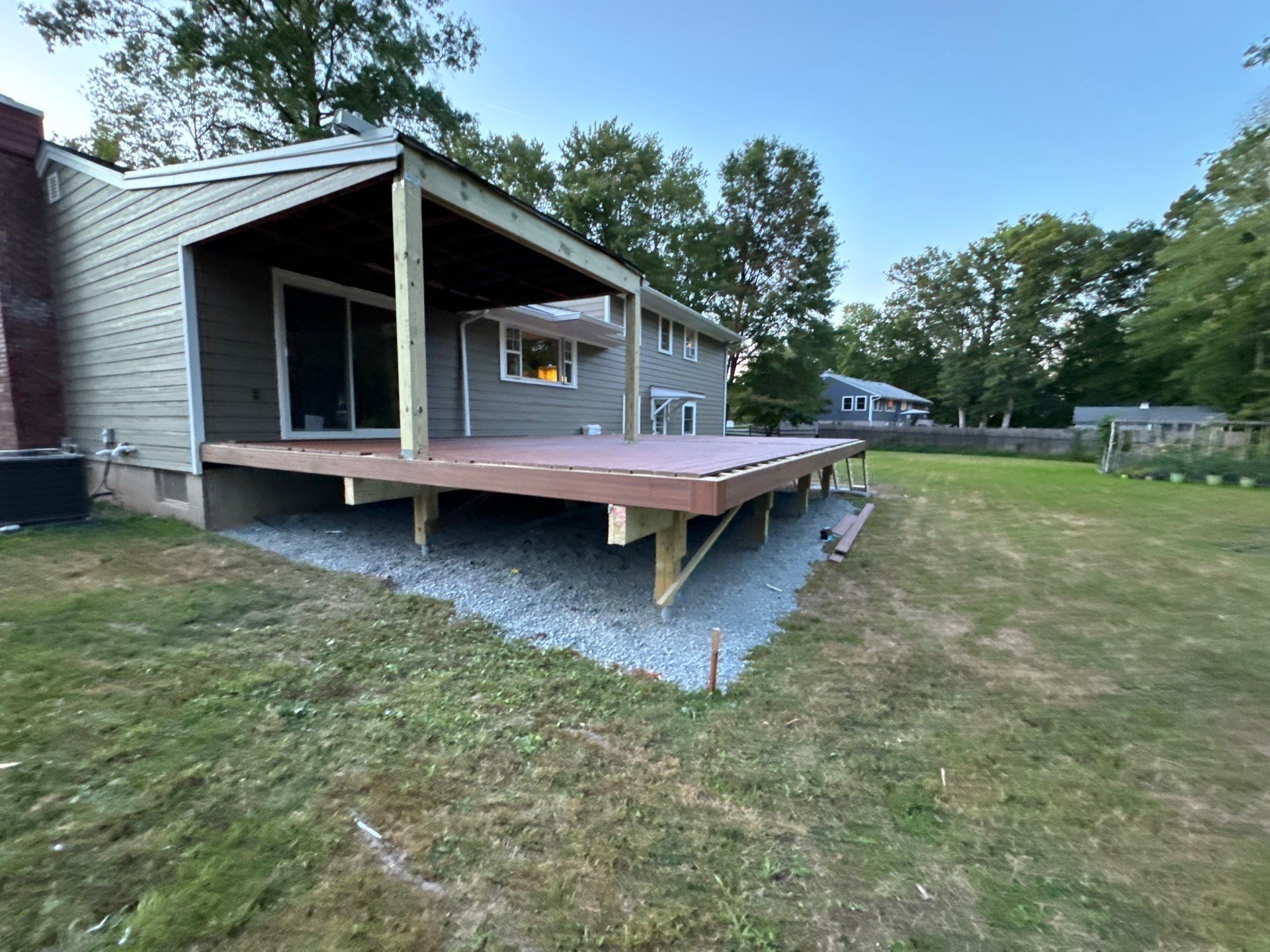 New Deck using Trex Tiki Torch  by deck guardian