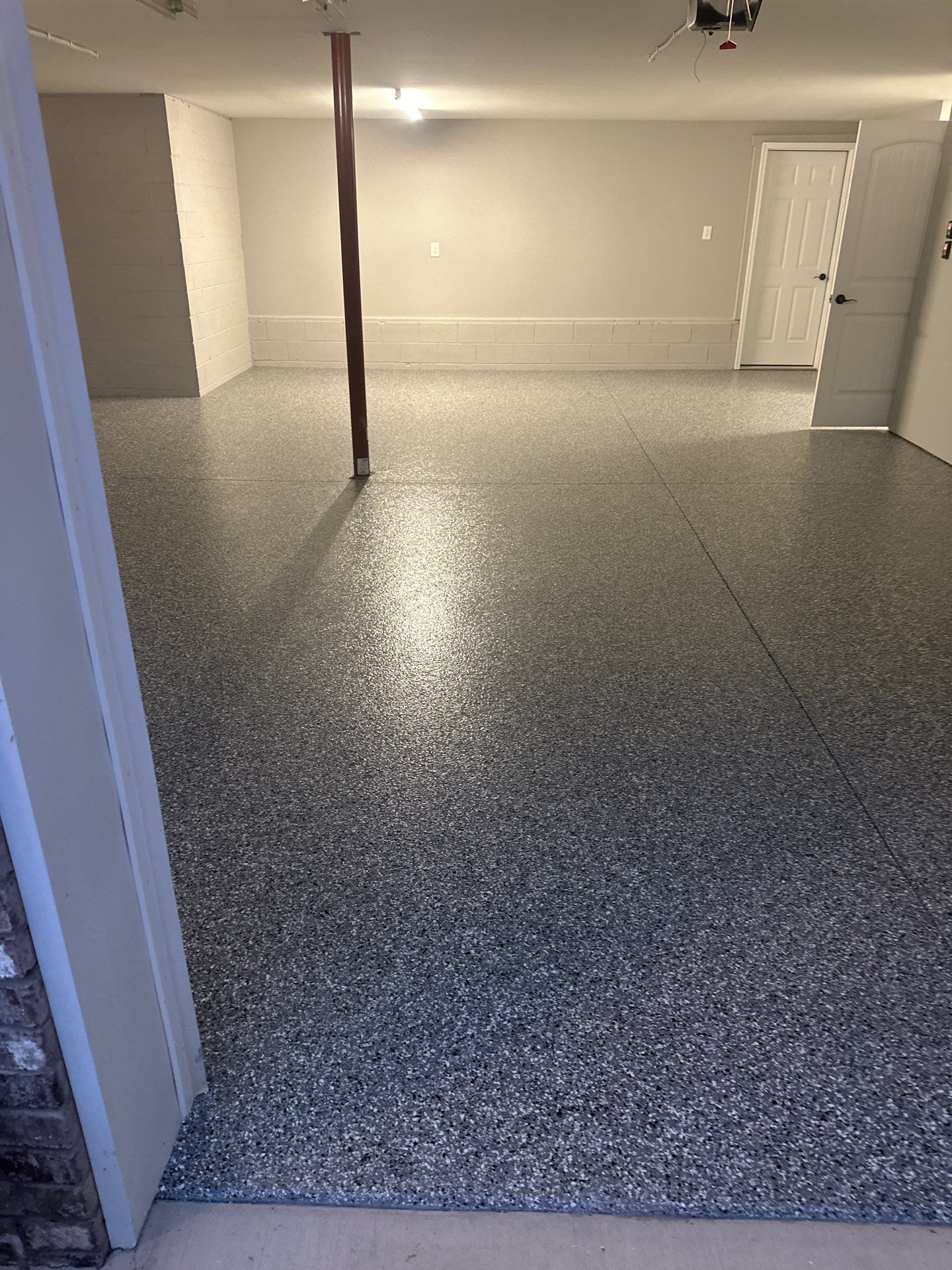 Garage Floor Coating using Wombat by My Garage Floor Guys