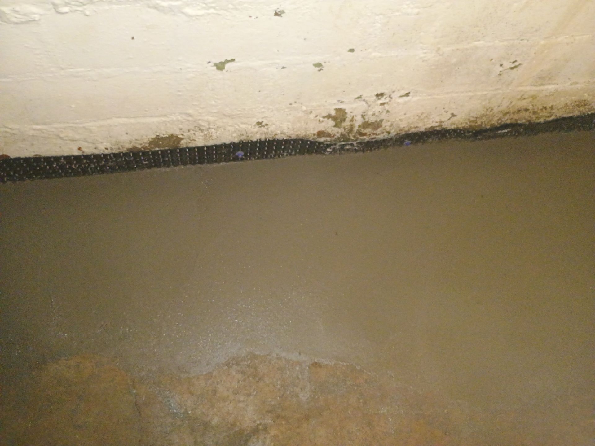 Interior Drain Tile & Sump Pump System in North Minneapolis by Waterproofing Northeast