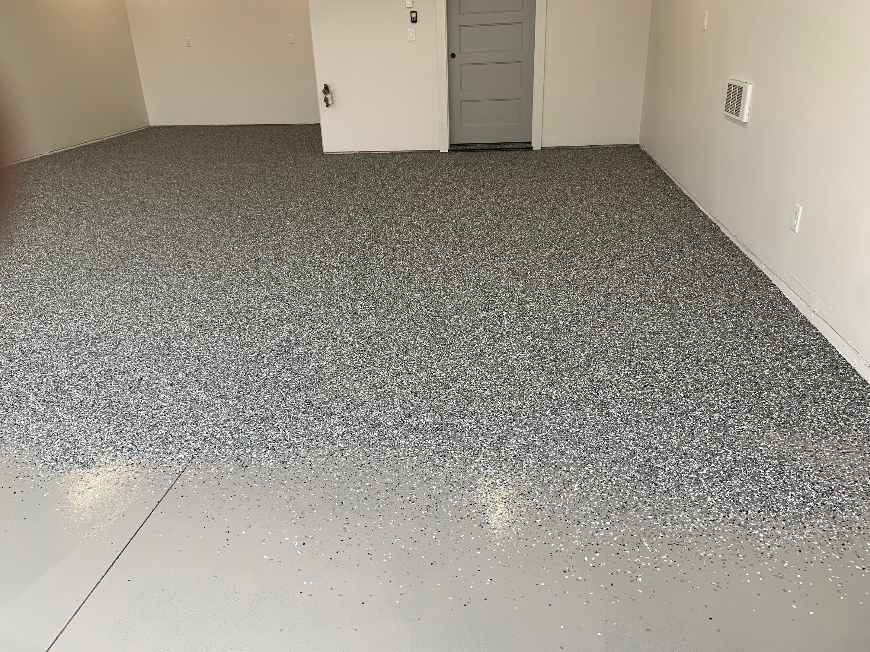 Garage Transformation using Smoke by Croc Coatings, LLC