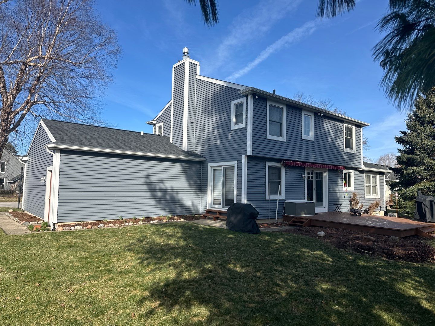 Complete Roof and Siding Installation in Haslett by Acme Exteriors
