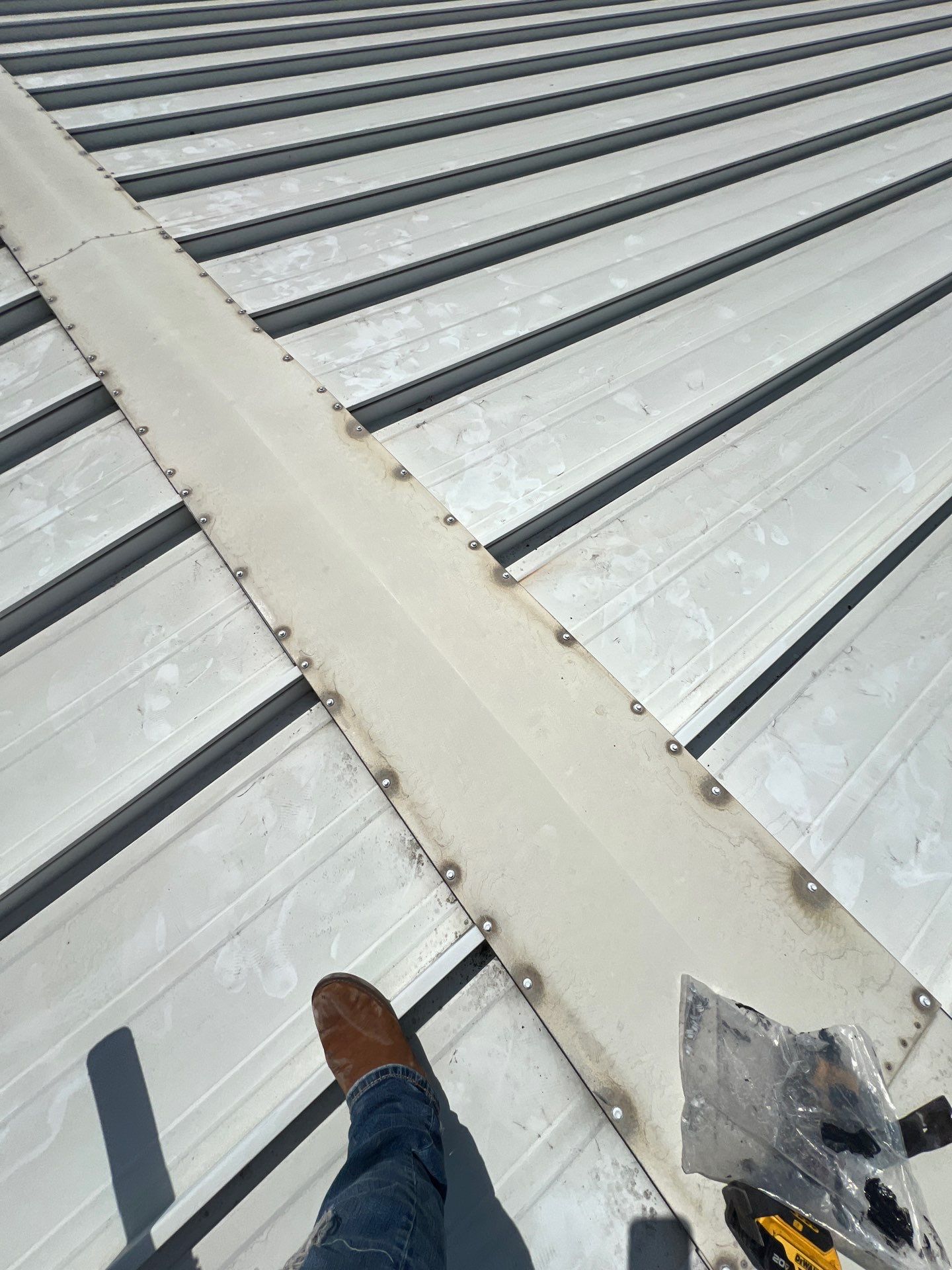 Commercial Roofing Repair using Metal by Roof Repair Company