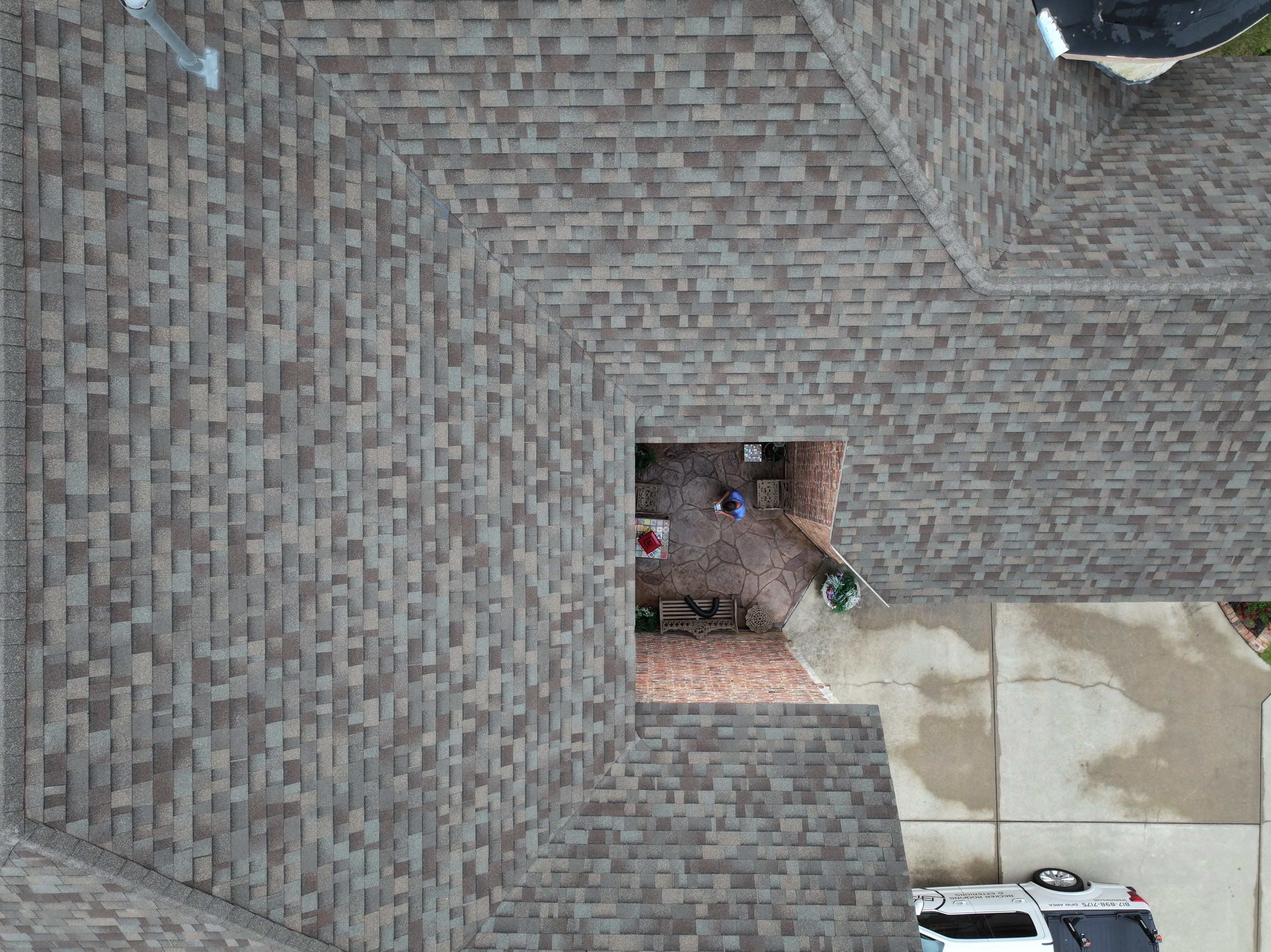 Installing Custom copper turret and Malarkey Vista Class 4 shingles Hail Damage Upgrade by Becker Roofing and Exteriors
