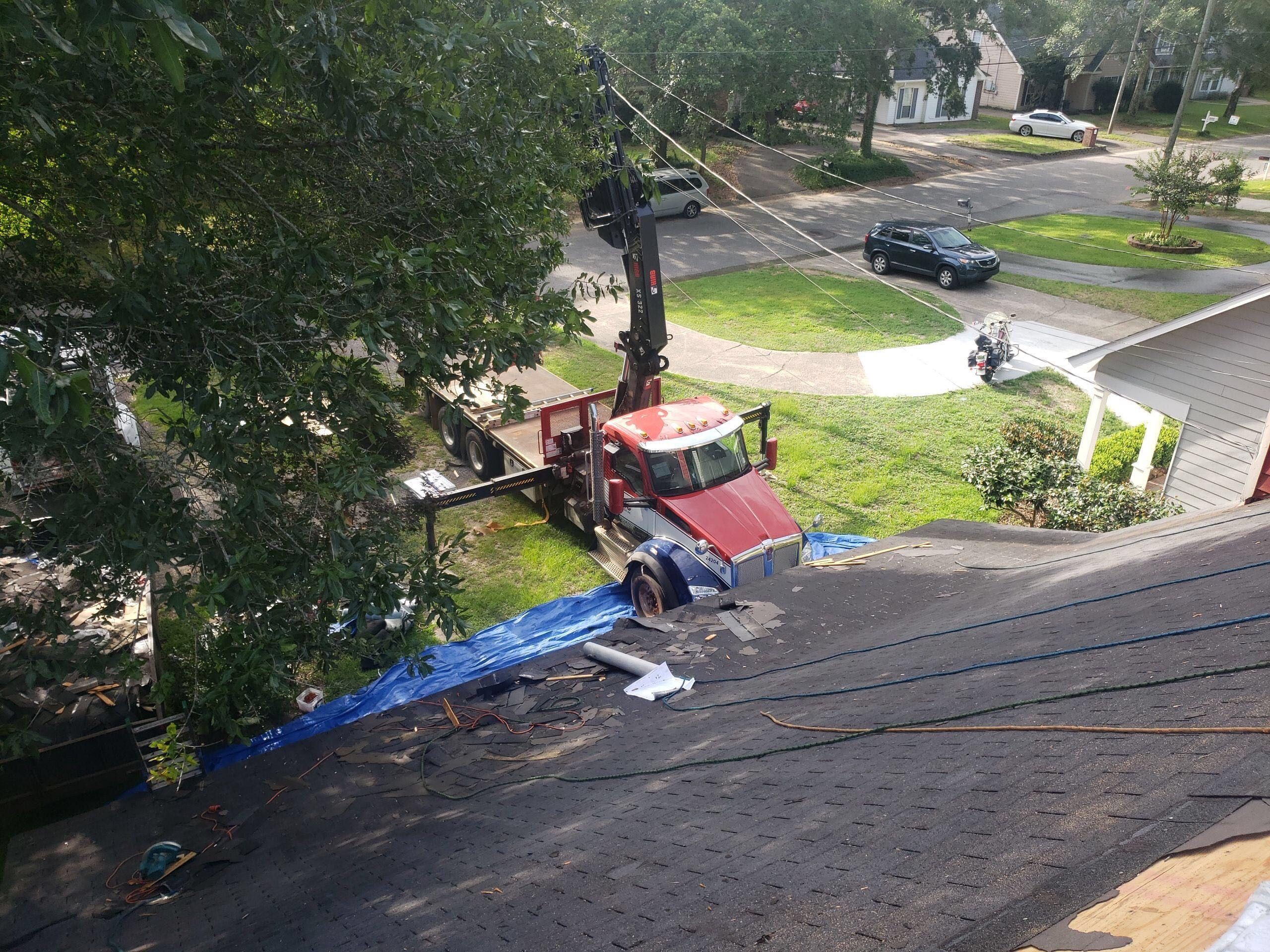 Residential Roofing Installation using Roof Replacement by American Roofing & Construction LLC