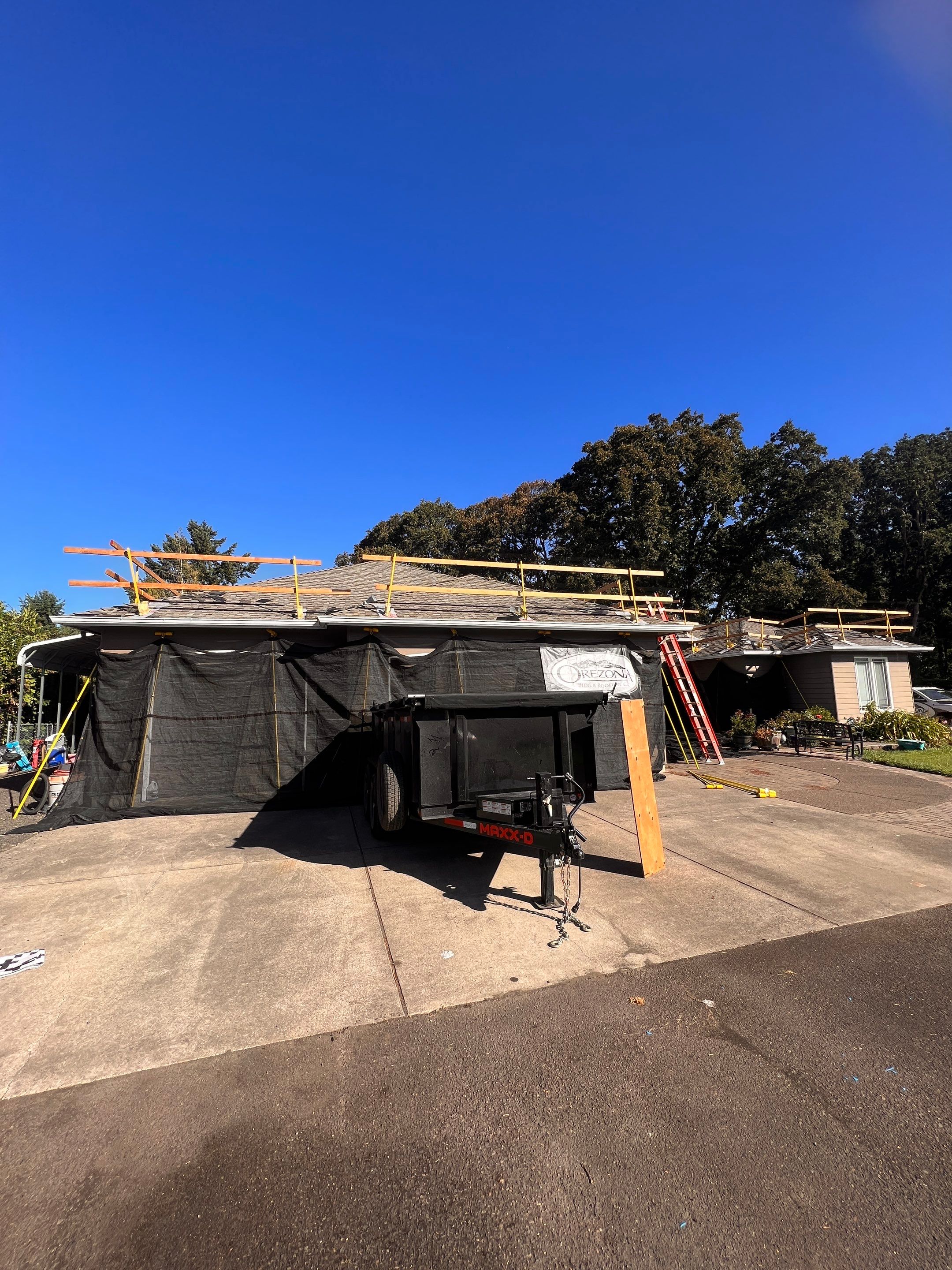 Residential Roofing Installation using IKO Dynasty (Color: Biscayne) by Orezona Building & Roofing Company, Inc.