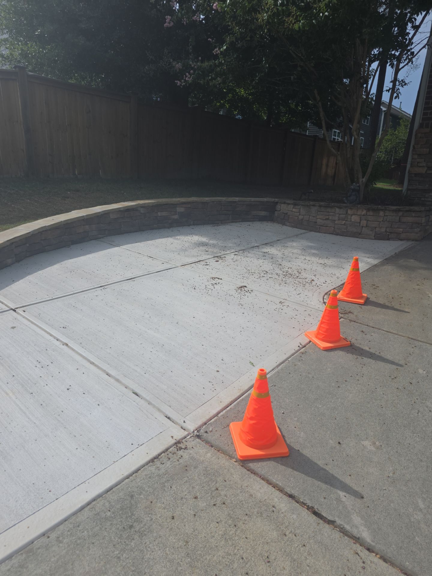 Concrete Driveway Expansion & Retaining Wall | Apex, NC by Elite Remodeling and Design LLC