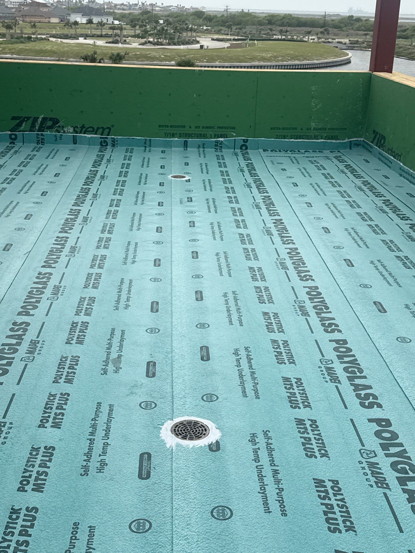 Walk Out, Island Style by Bayfront Roofing and Construction