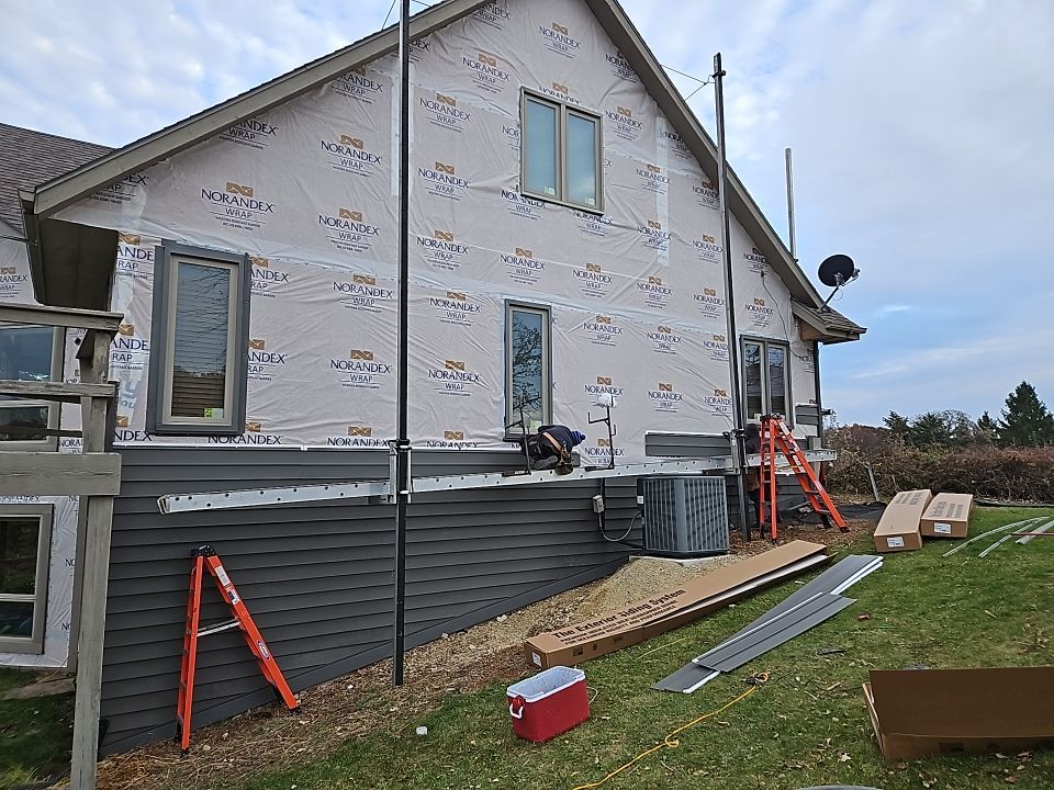 Siding Installation using Norandex Polar Wall Plus Siding, Window Wraps by Total Exteriors
