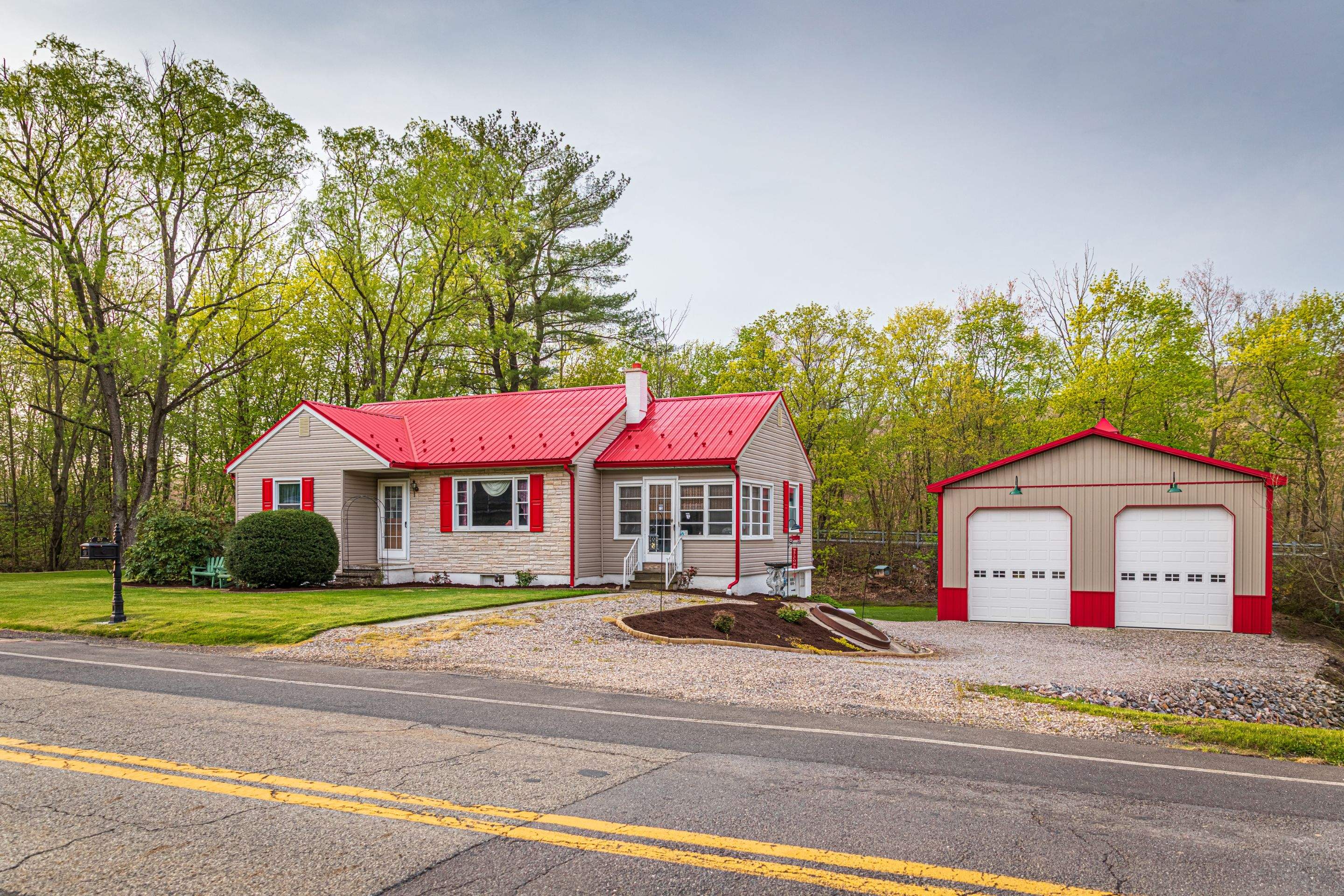 Metal Roof-scarlet red by Esh Builders