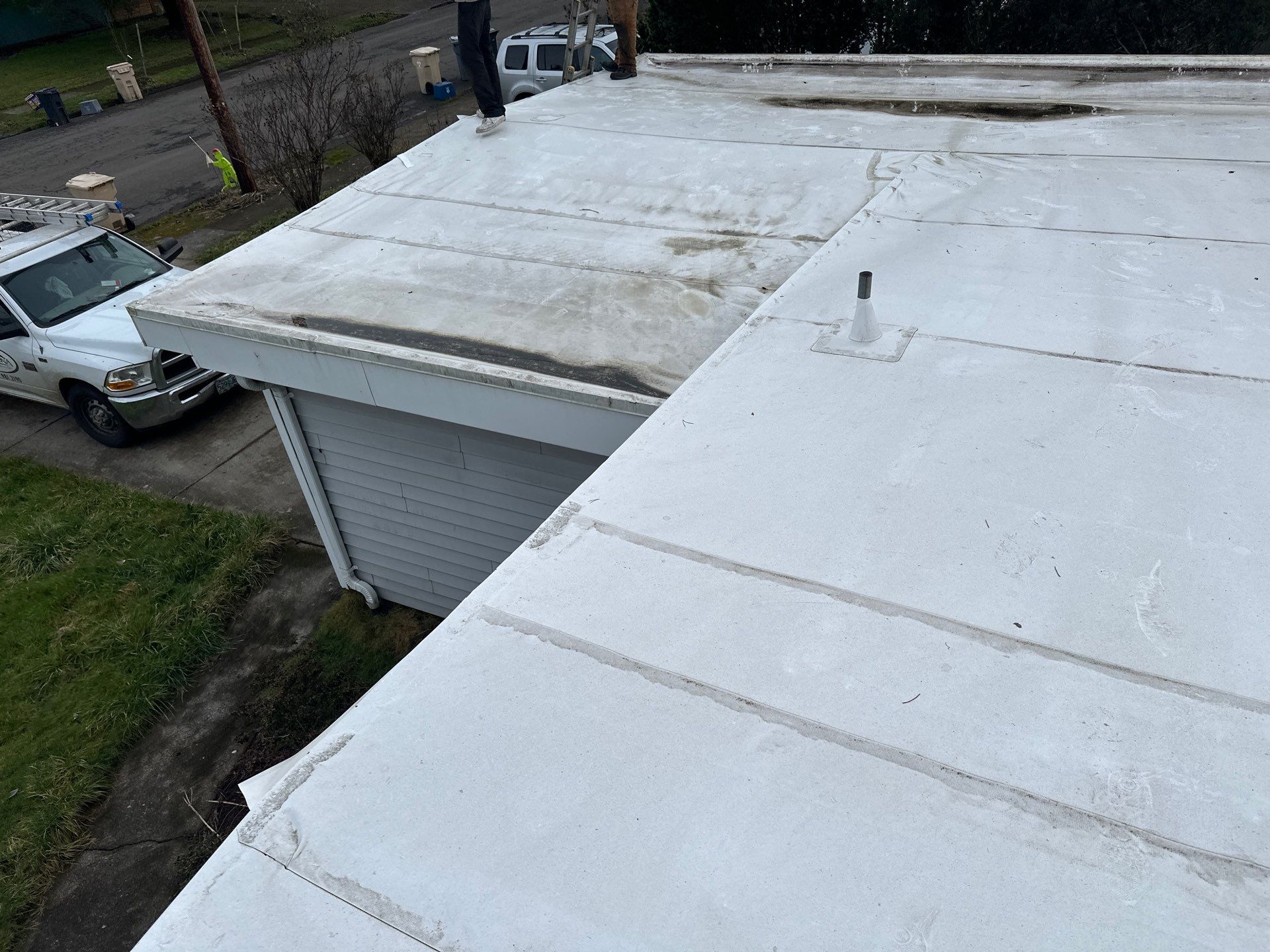 Residential Flat Roof Installation using GAF 60Mil TPO  by Orezona Building & Roofing Company, Inc.