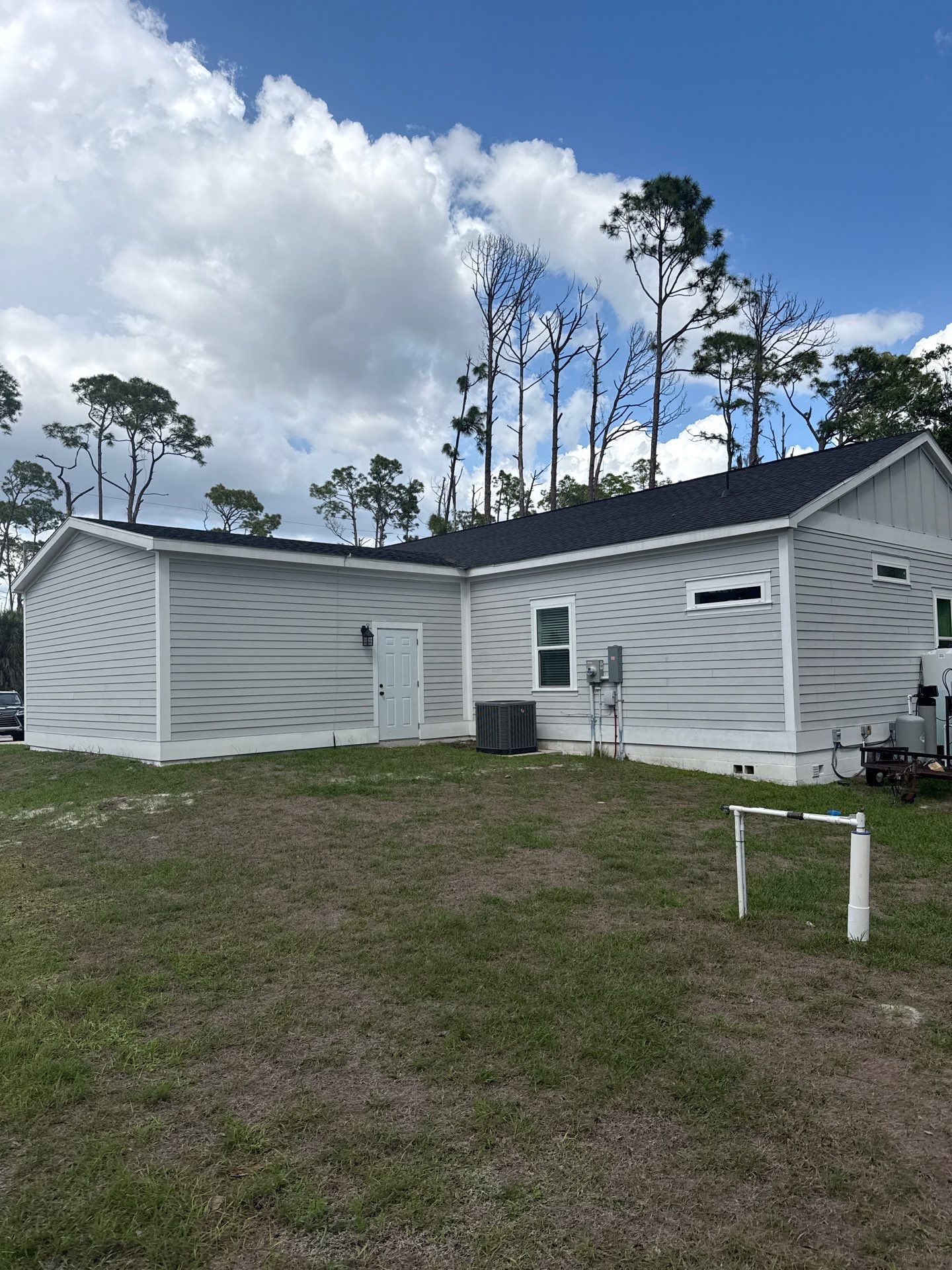 Downspout Installation using 3X4 Elbow Downspout in Port Charlotte FL by Gutter Professors