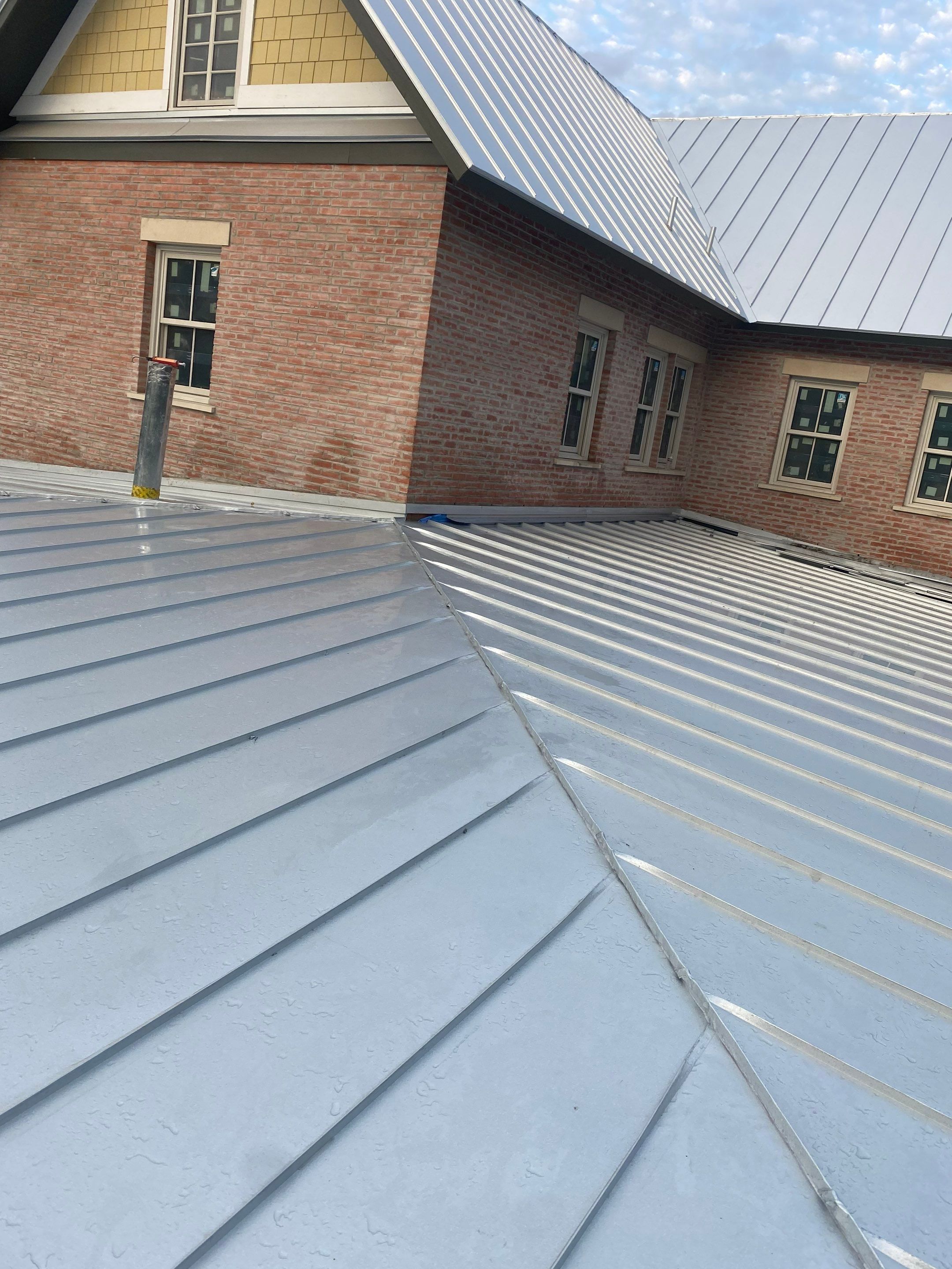Residential Metal Roof Installation using McElroy Metal by Premier Roofing and Contracting