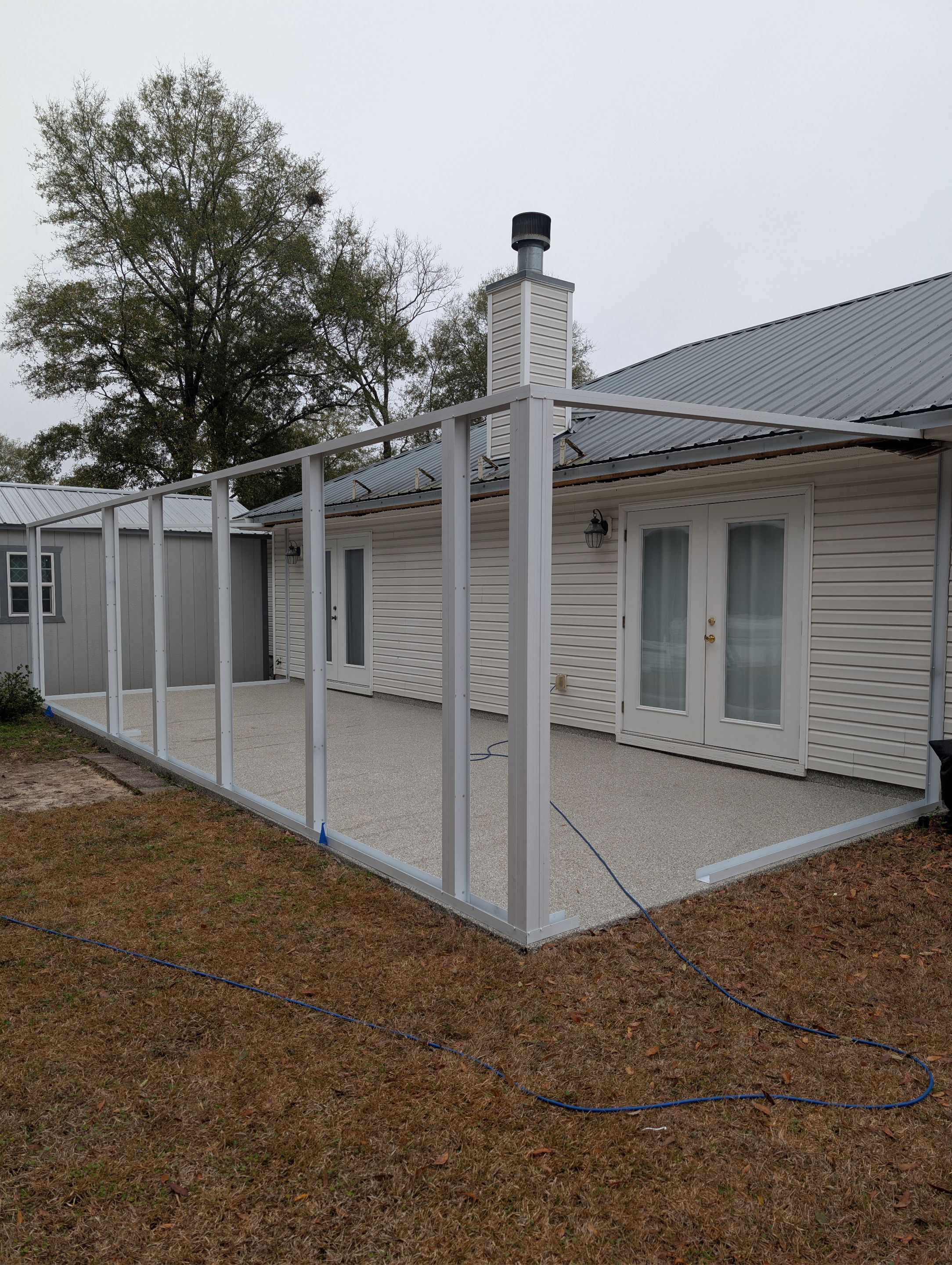 Large Divided Glass Room with Patio cover by Titan Sunrooms