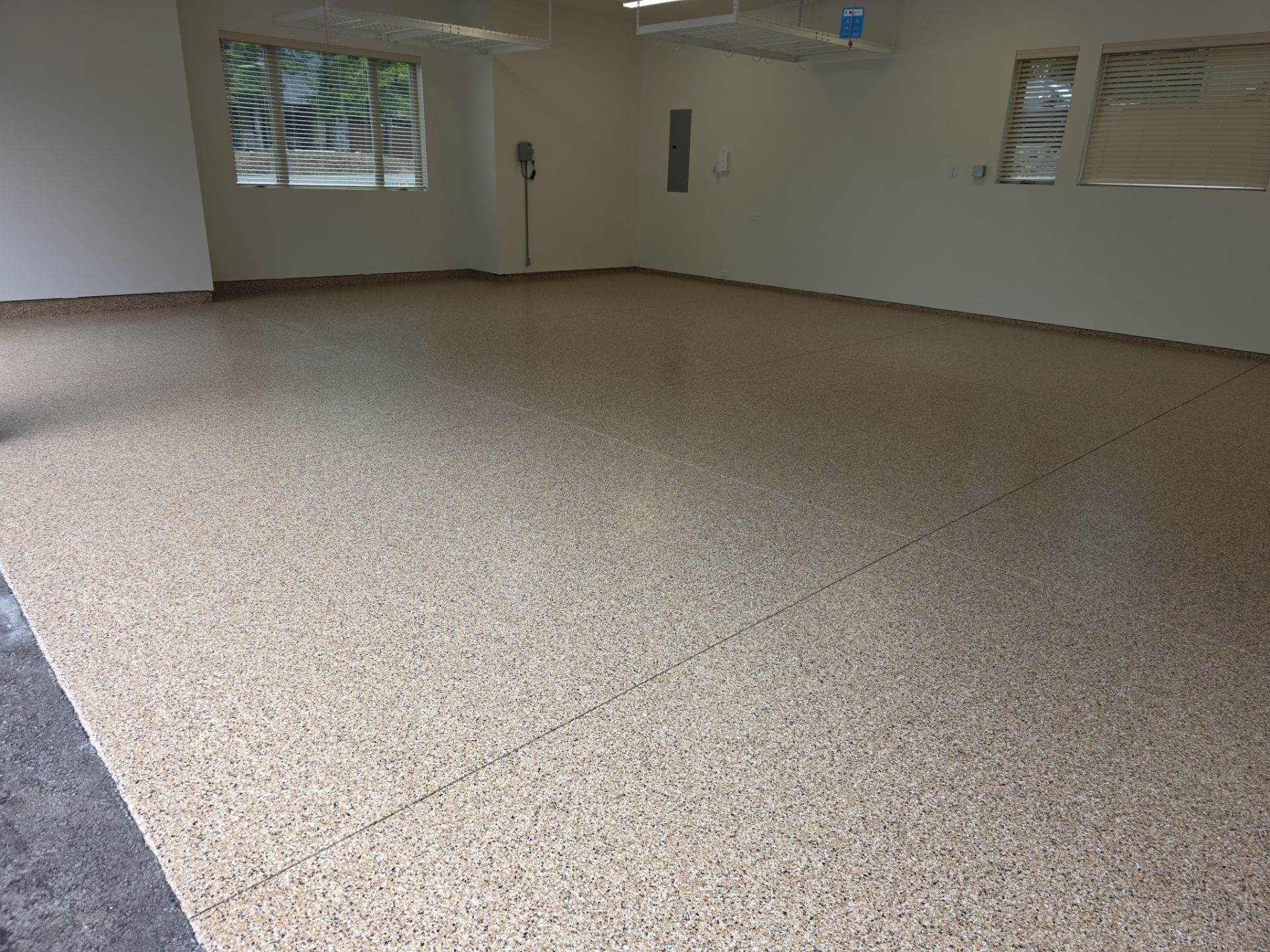Garage Transformation using Sandstone by Croc Coatings, LLC