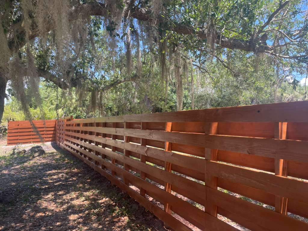 Horizontal Shadowbox Fence in Port Charlotte by True Fence LLC