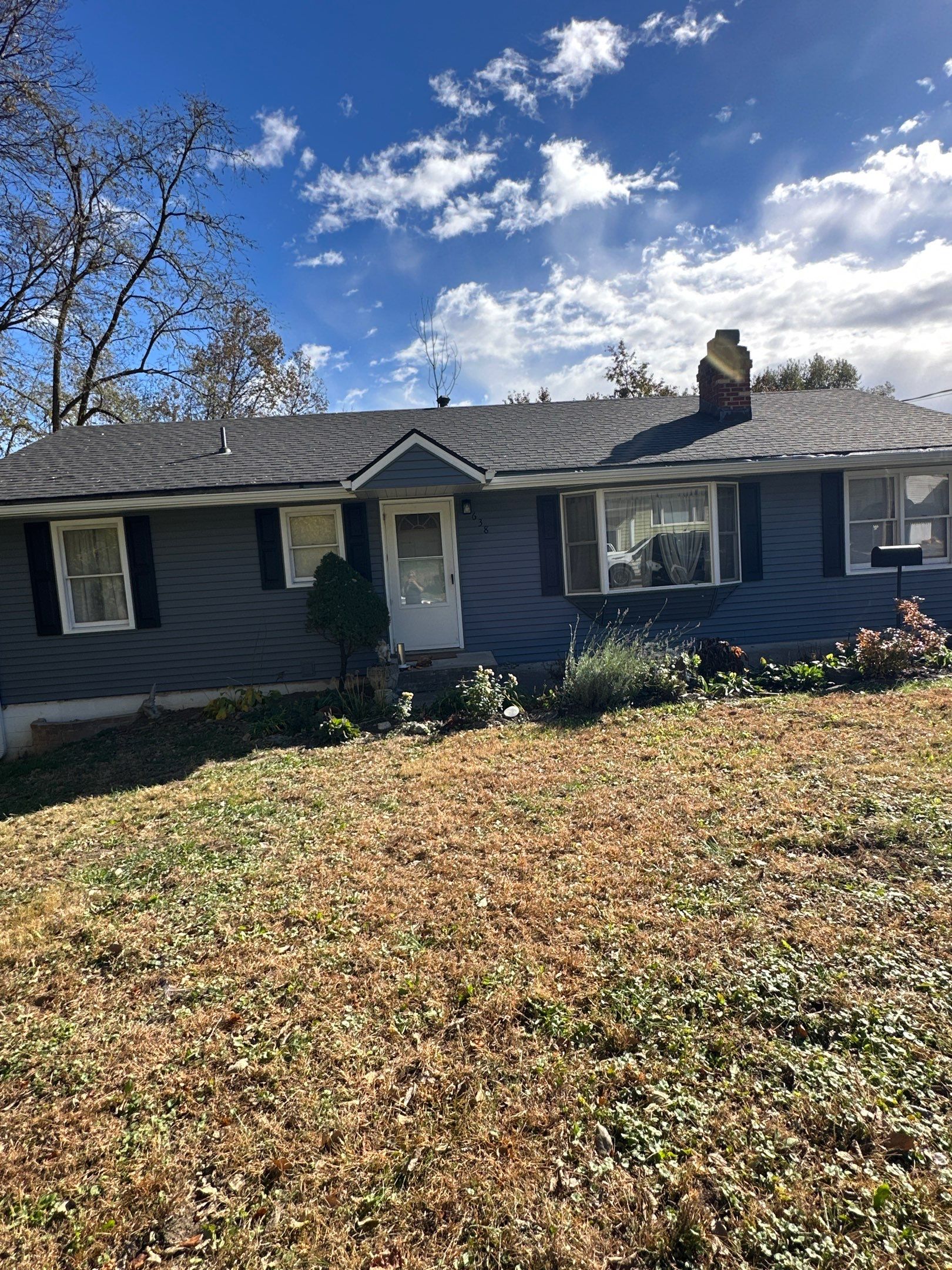 Feeling Blue in Weston Mo - Time for a Makeover by EEC Windows, Siding & Roofing