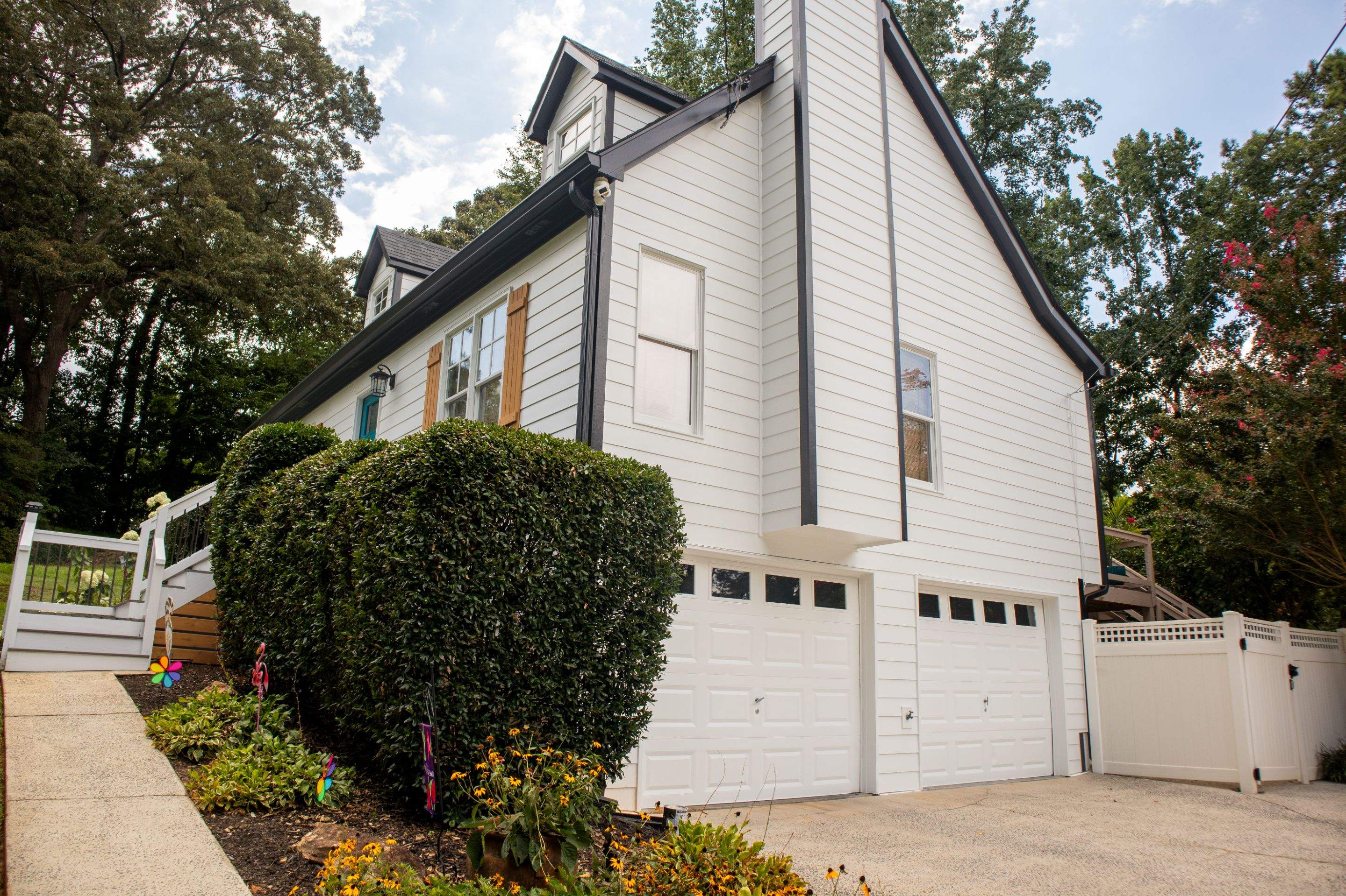 James Hardie Siding Install, Rotten Wood and Gutter Replacement and Exterior Painting by Nelson Exteriors