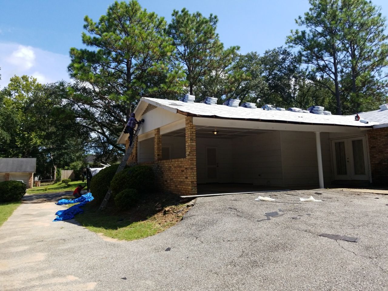 Residential Roofing Installation using Roof Replacement by American Roofing & Construction LLC