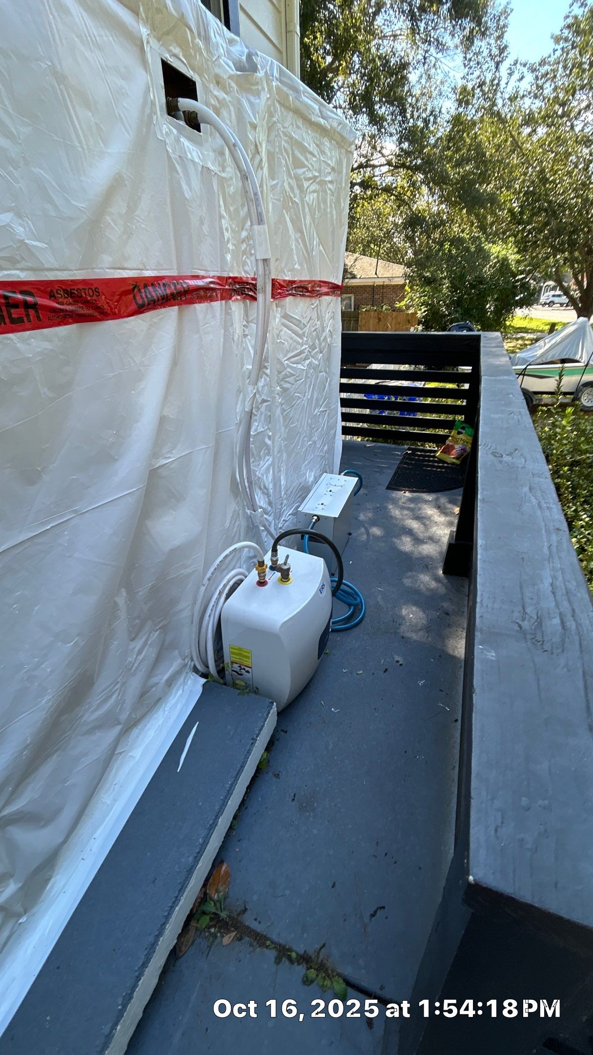 Friable asbestos ceiling abatement with air monitoring by EAS Environmental, LLC.