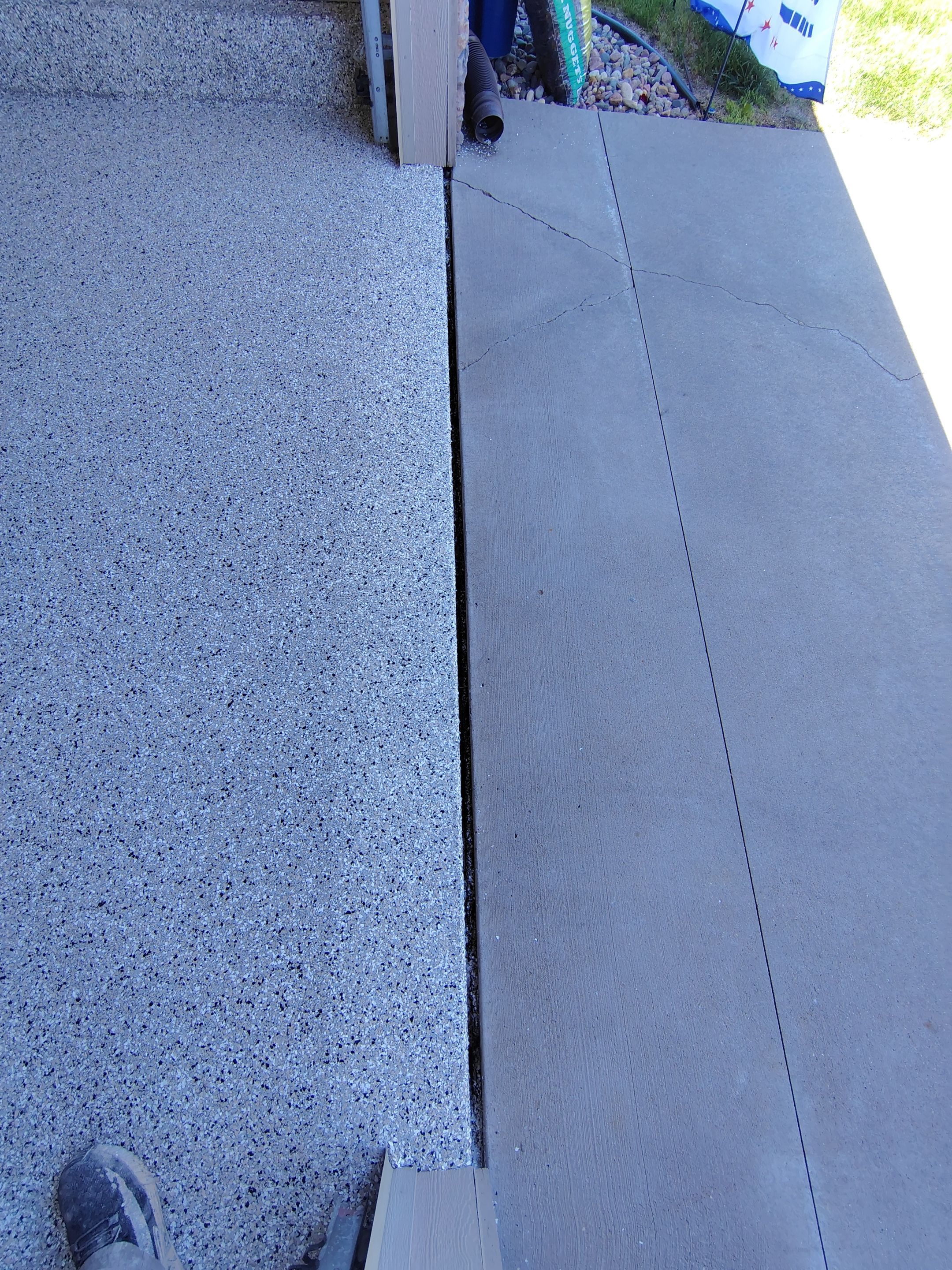 Multi-Car Garage Concrete Coating and Epoxy Finish in Sioux Falls by Select Painting, Coatings & Garage Cabinets