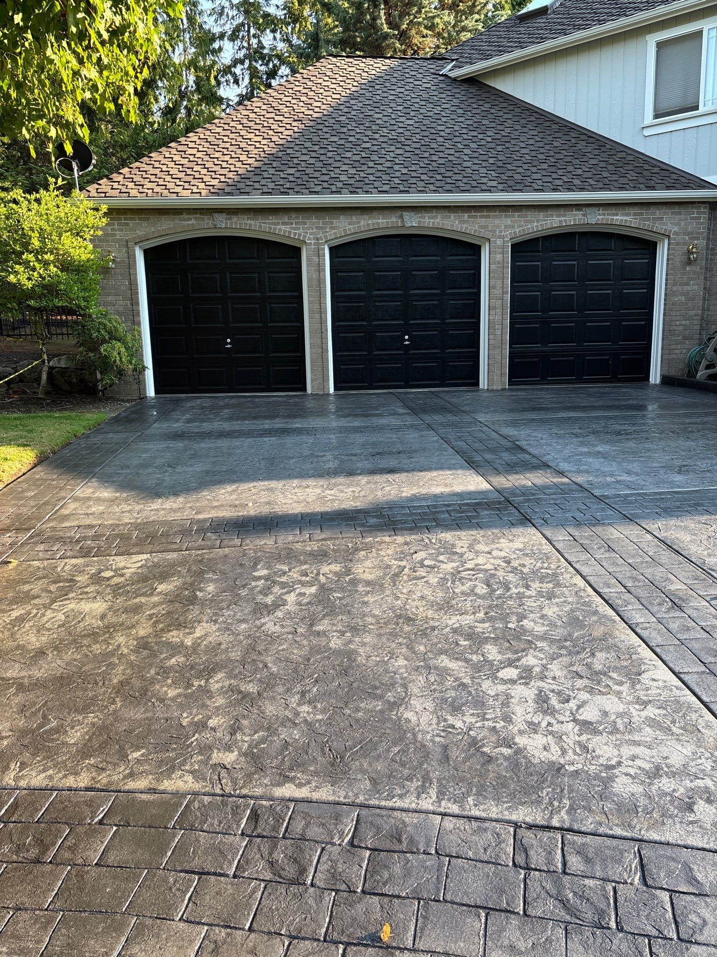 Multi-color Stamped & Sealed Concrete Driveway Renovation | Mukilteo by Jireh Asphalt & Concrete Inc