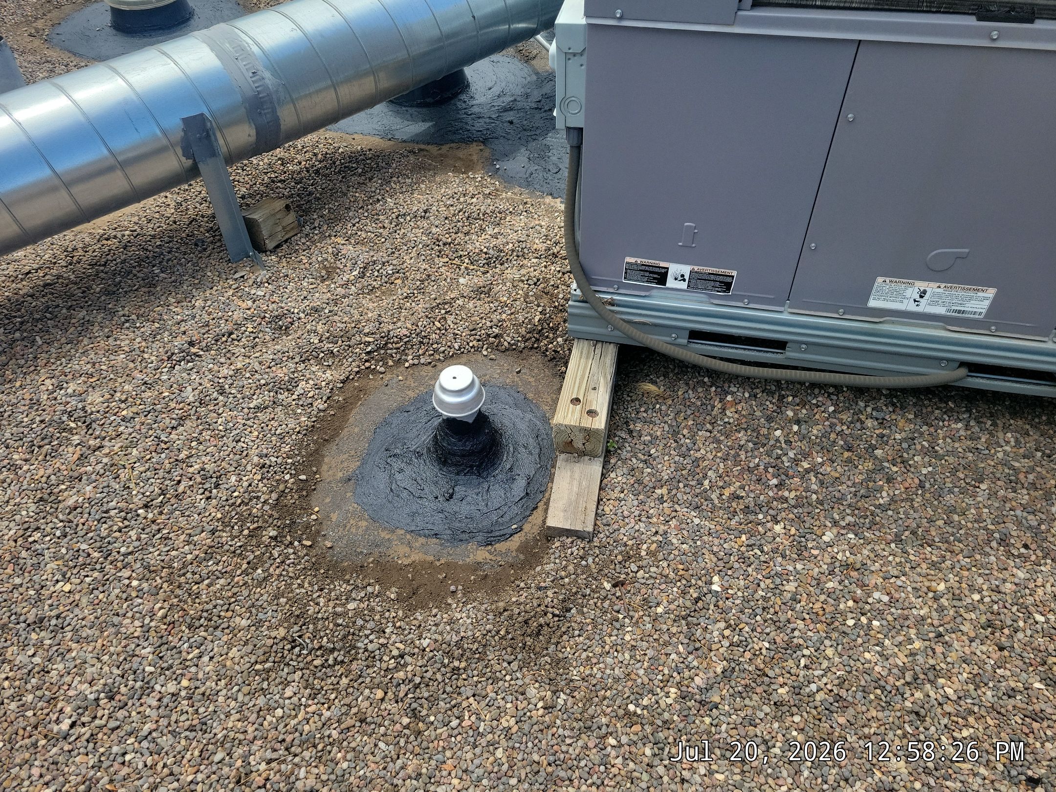 Tar and Gravel Roof Maintenance and Penetration Sealing in Albuquerque by Doyle Roof Masters Inc