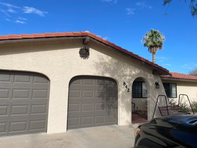 Residential Tile Roof Restoration and Low Slope Membrane Replacement in Tucson