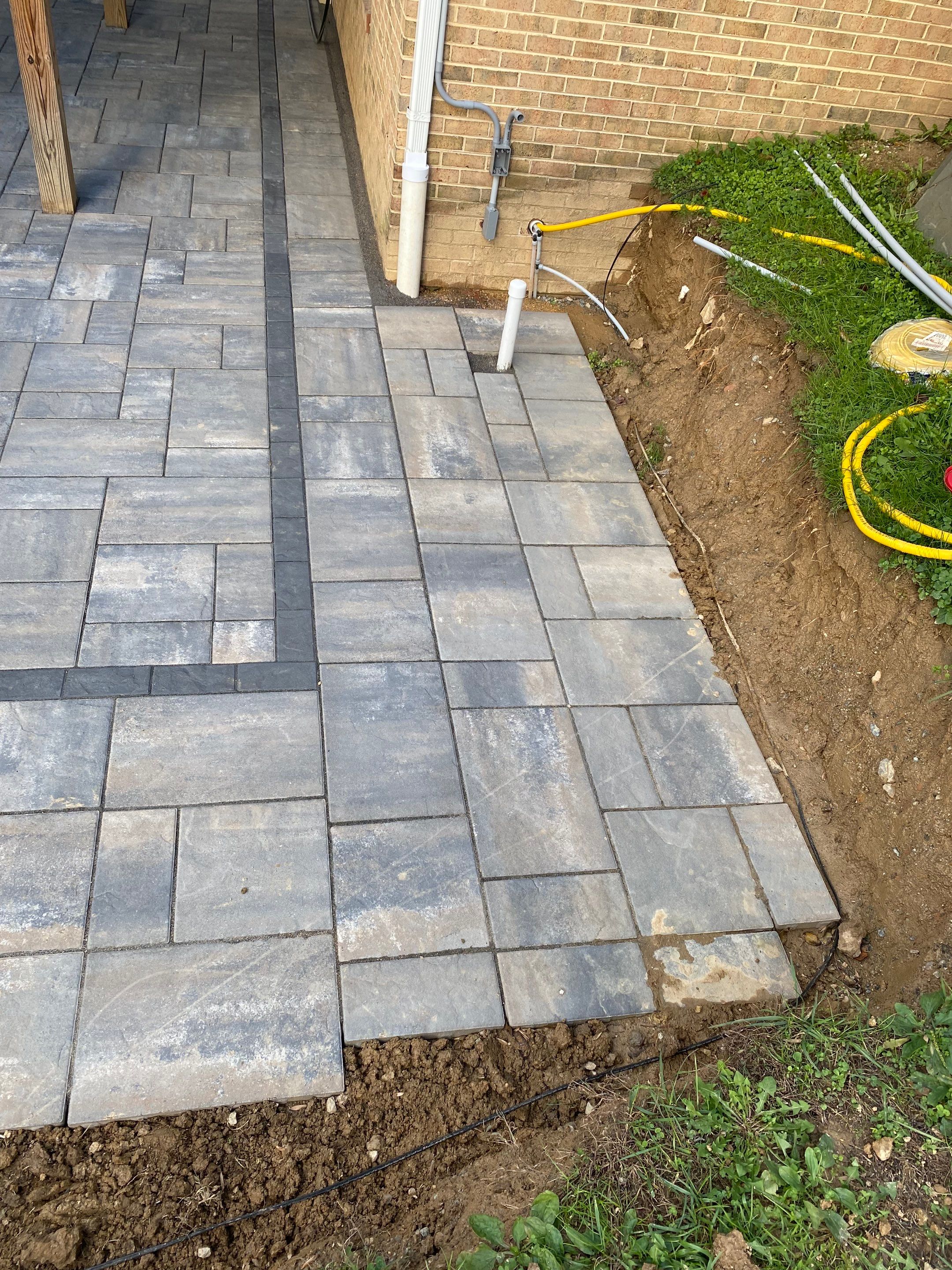 Backyard Transformation using Techo-Bloc Pavers by The Smet Companies, LLC