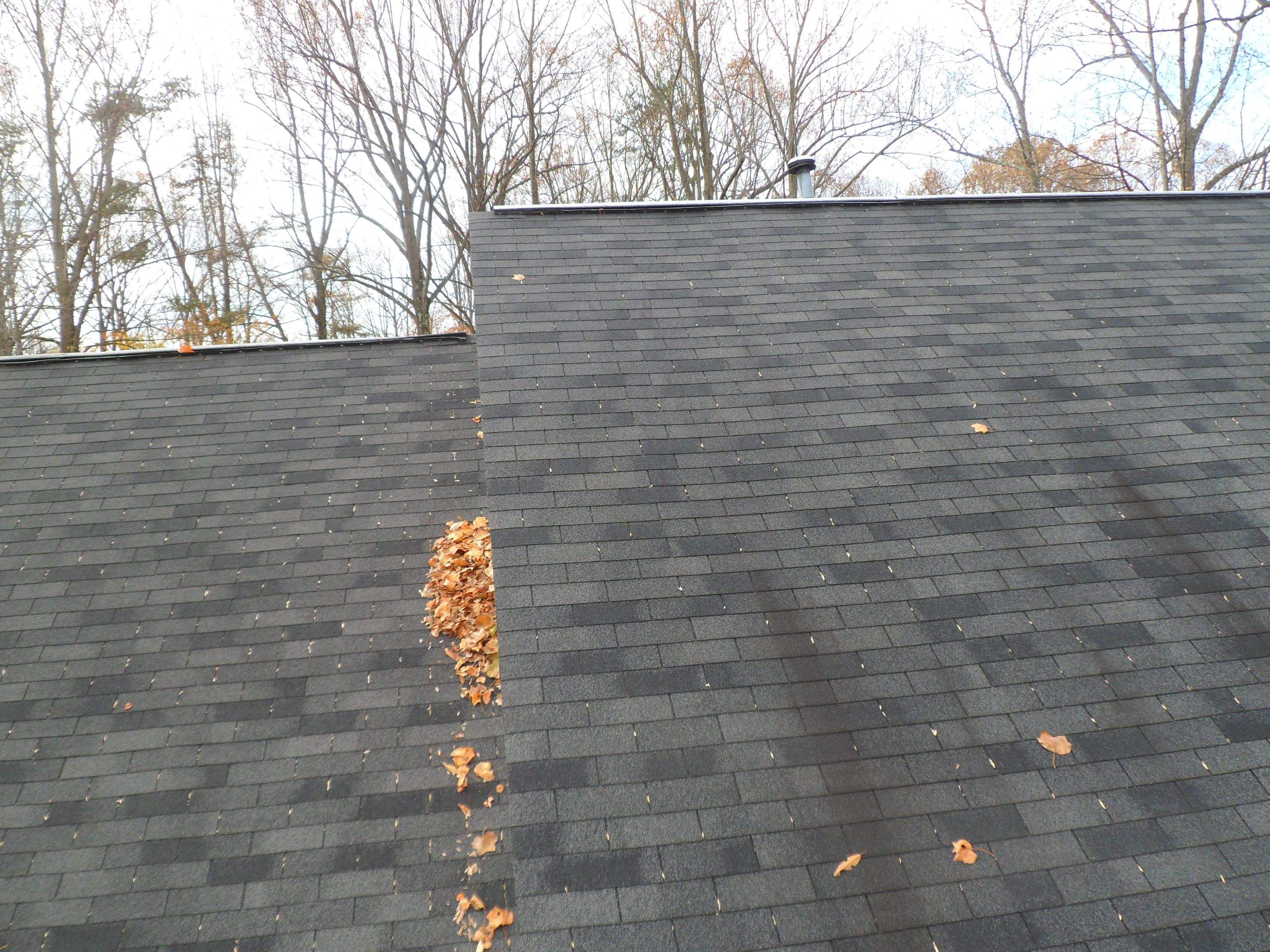 Residential Roofing Installation using Charcoal Black by Alpha Design Services