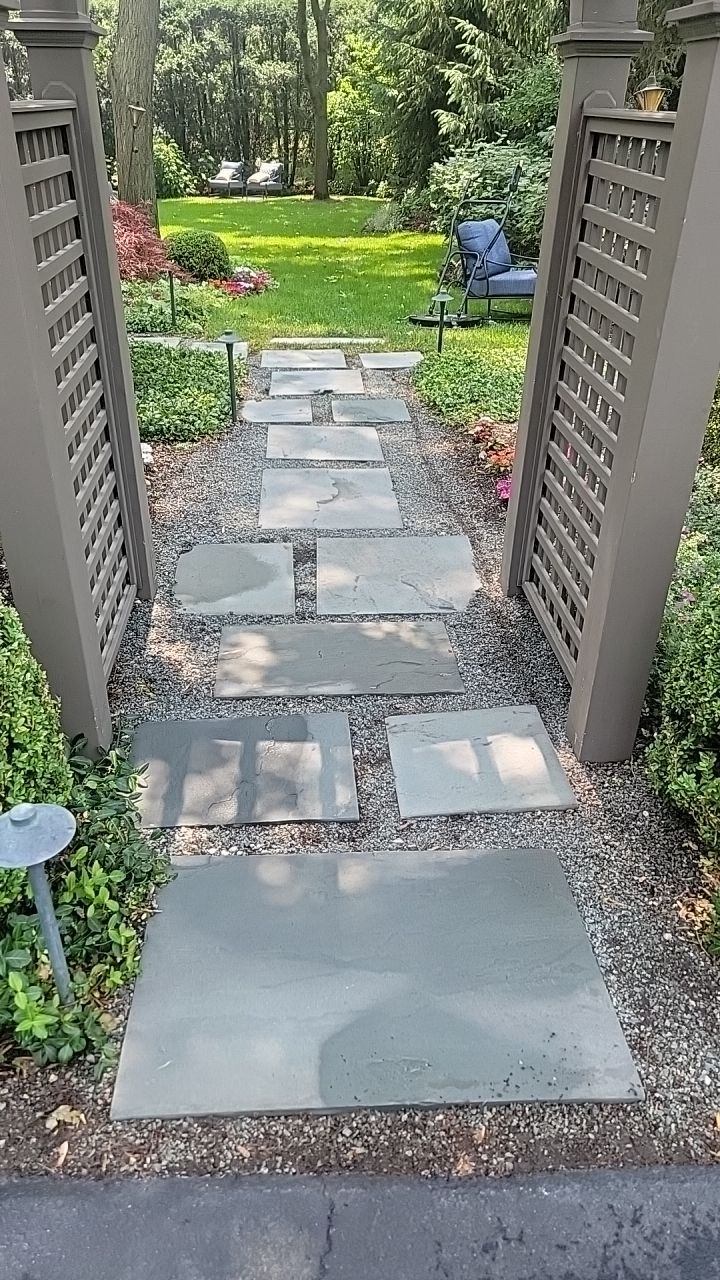 Northbrook, IL stucco home soft wash and stone cleaning by Northern Power Washing LLC.